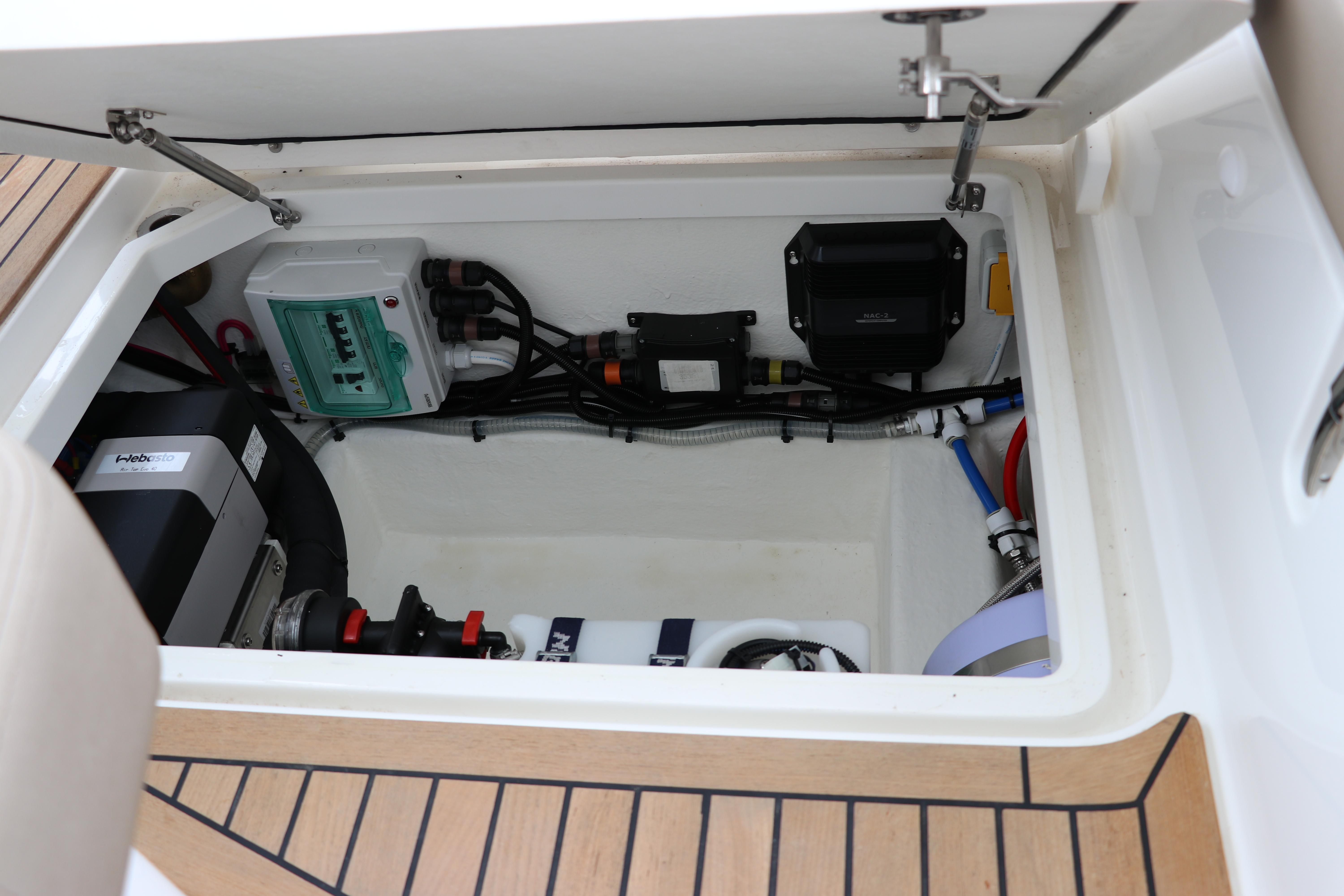 2024 Nimbus Weekender 9 engine compartment with electrical components and wiring.