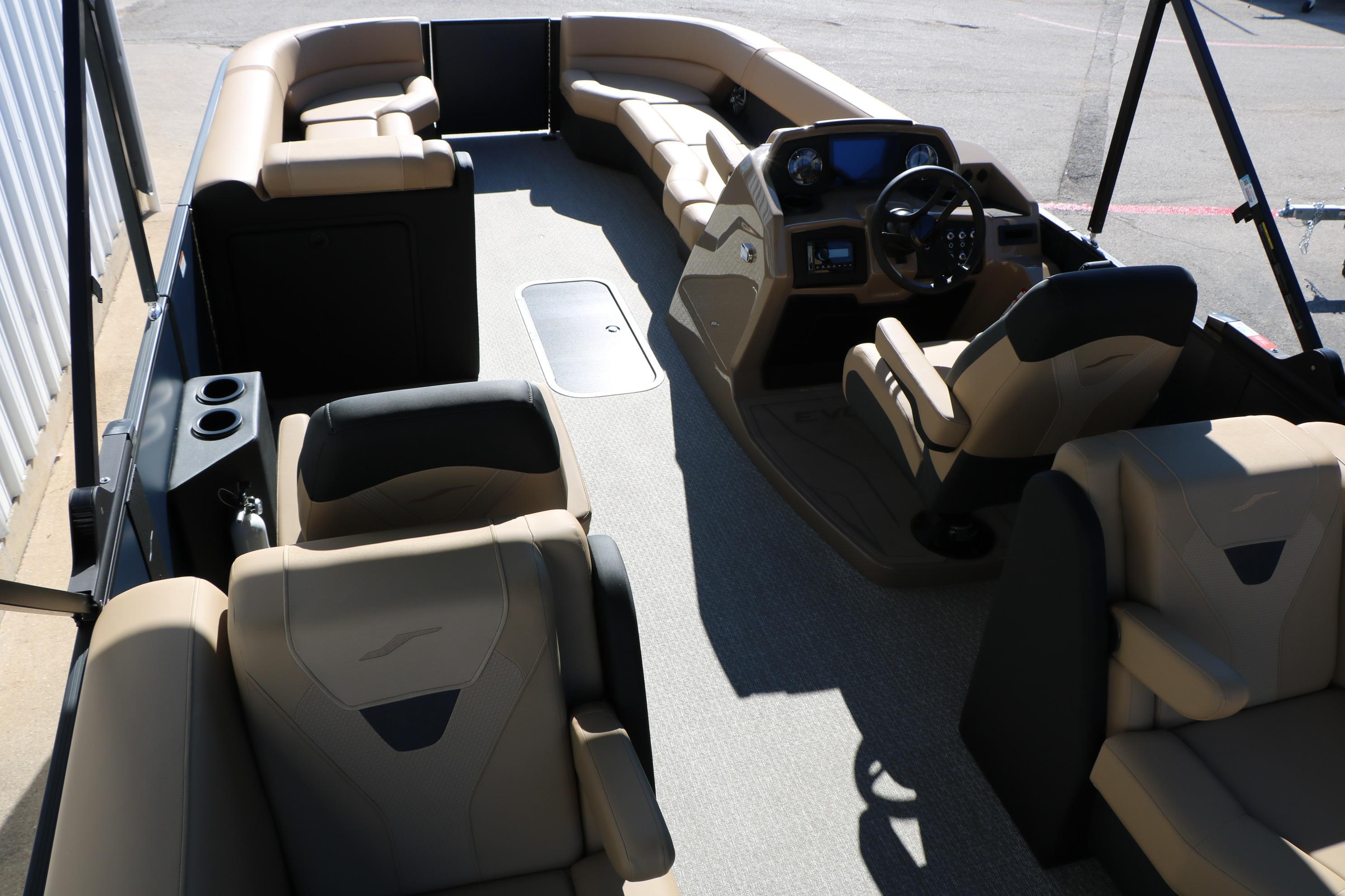 2026 Evotti 525 QL Tri-Toon boat interior with luxurious seating and modern dashboard.