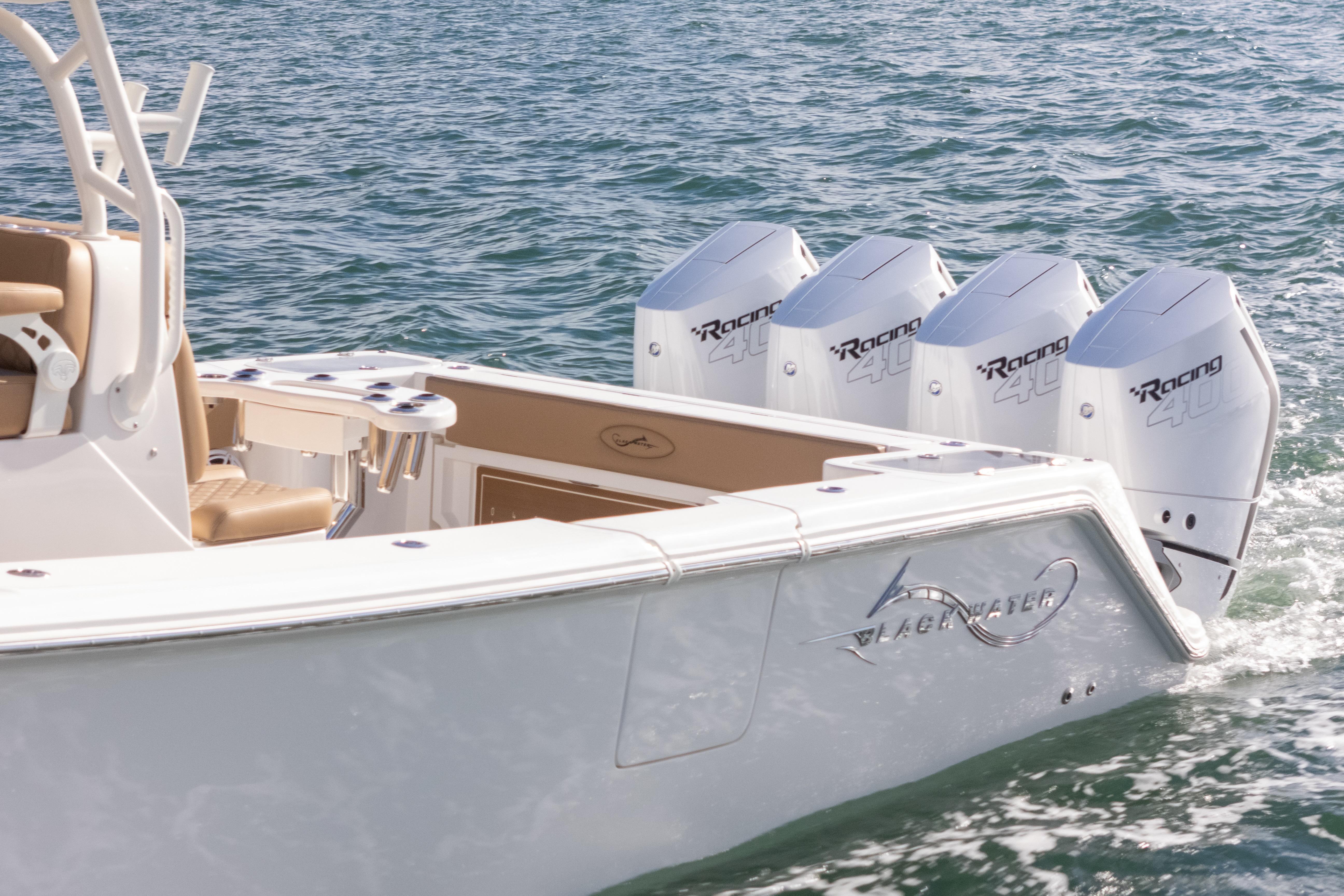 2026 Blackwater 41 Performance Fish boat with four powerful outboard engines on the water.