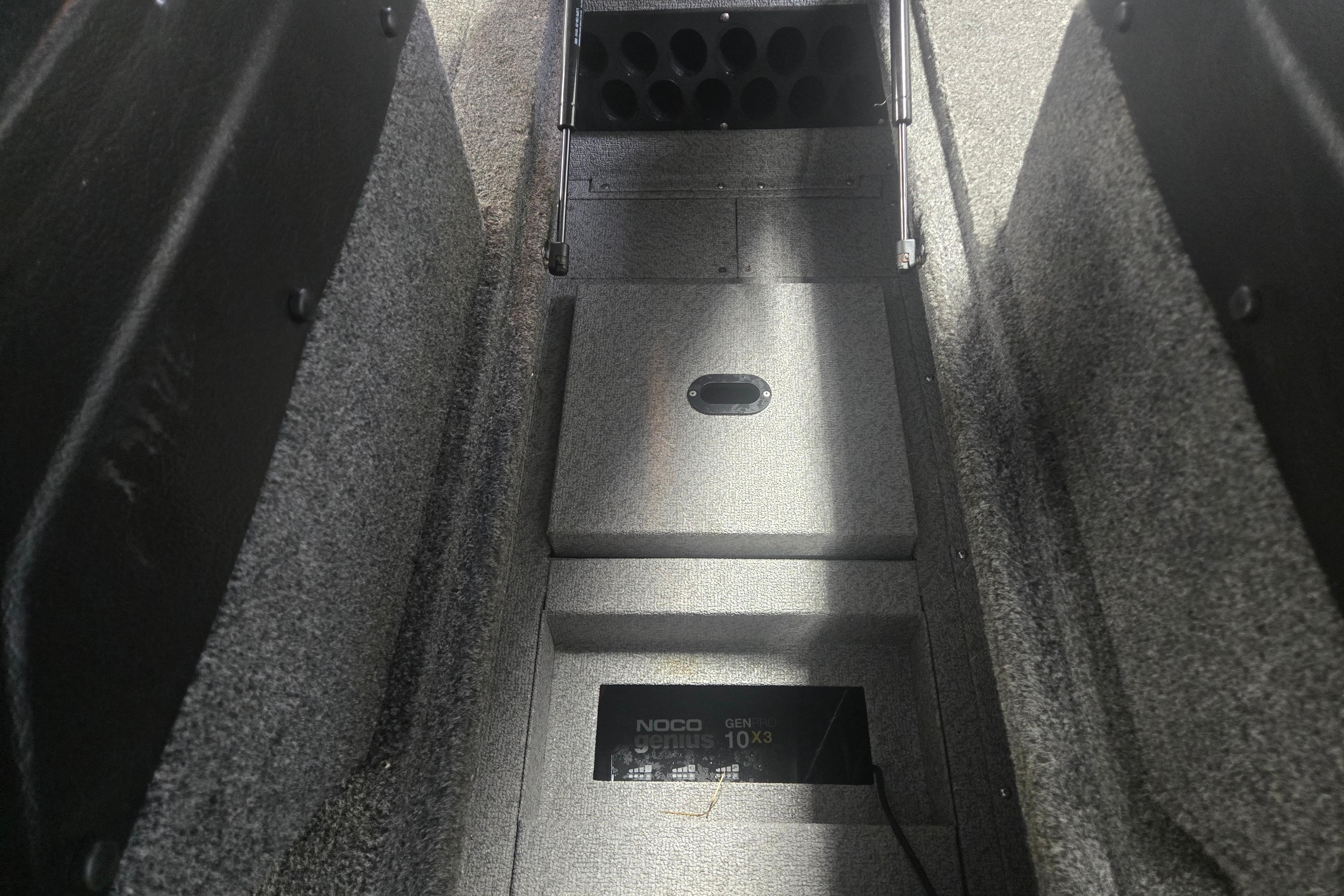 Interior view of 2020 Crestliner 1850 Raptor WT boat, featuring storage compartments.