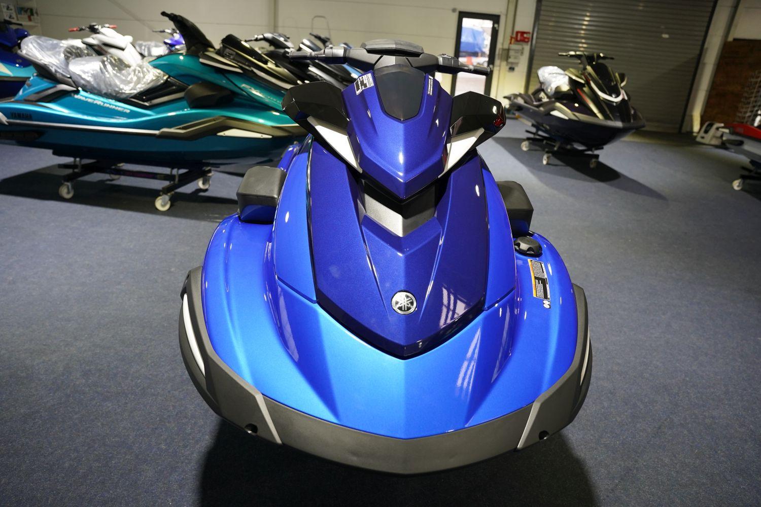 2026 Yamaha WaveRunner VX Limited HO in showroom, vibrant blue color.