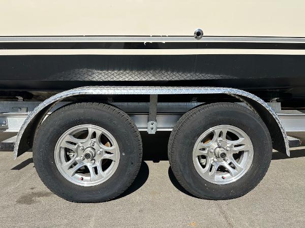 2023 Defiance Admiral 220 EX trailer with dual wheels and metal fenders.