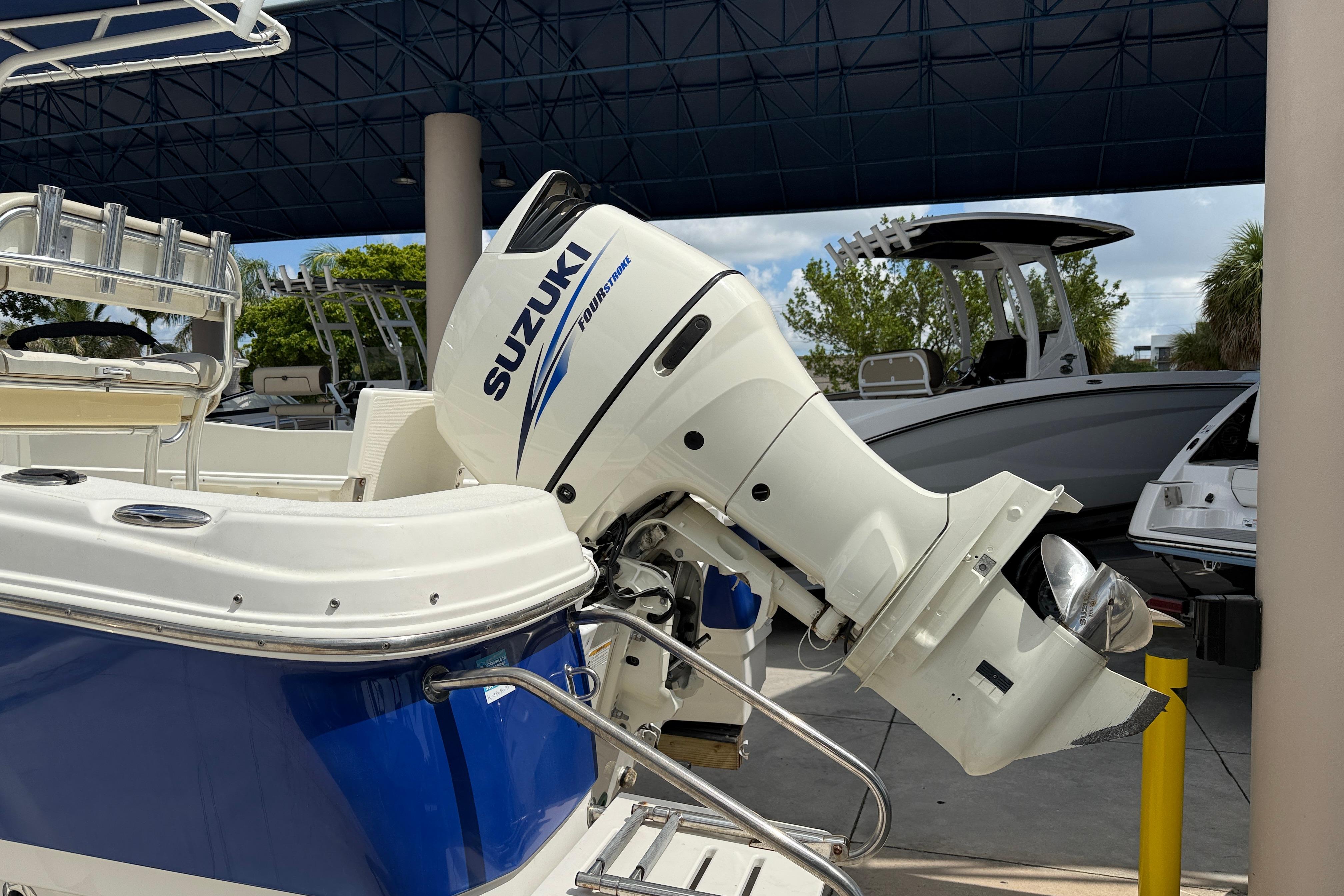 2015 NauticStar 231 Coastal boat with Suzuki Four Stroke outboard motor.