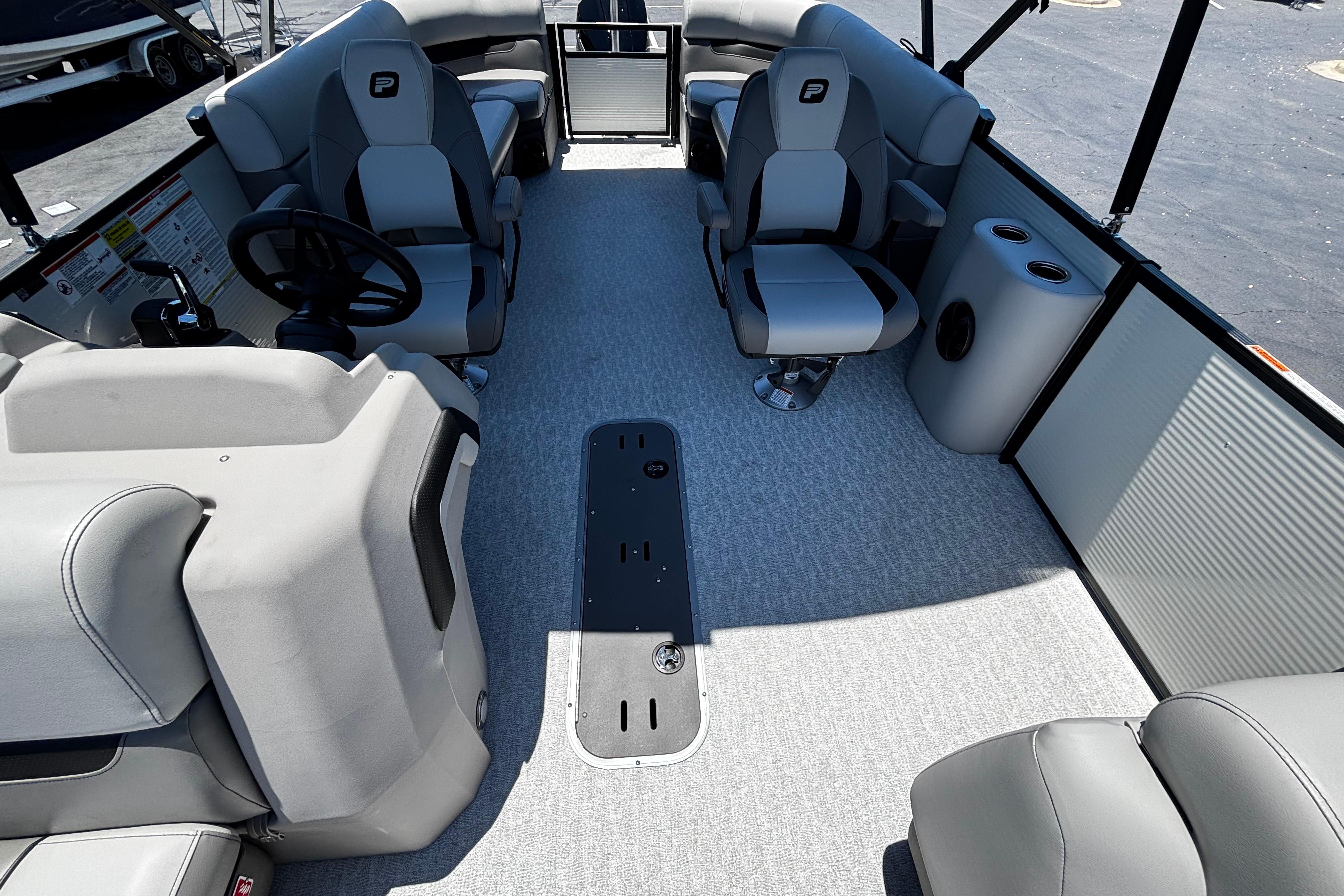 2026 Princecraft Vectra 23 QL pontoon boat interior with modern seating and steering console.