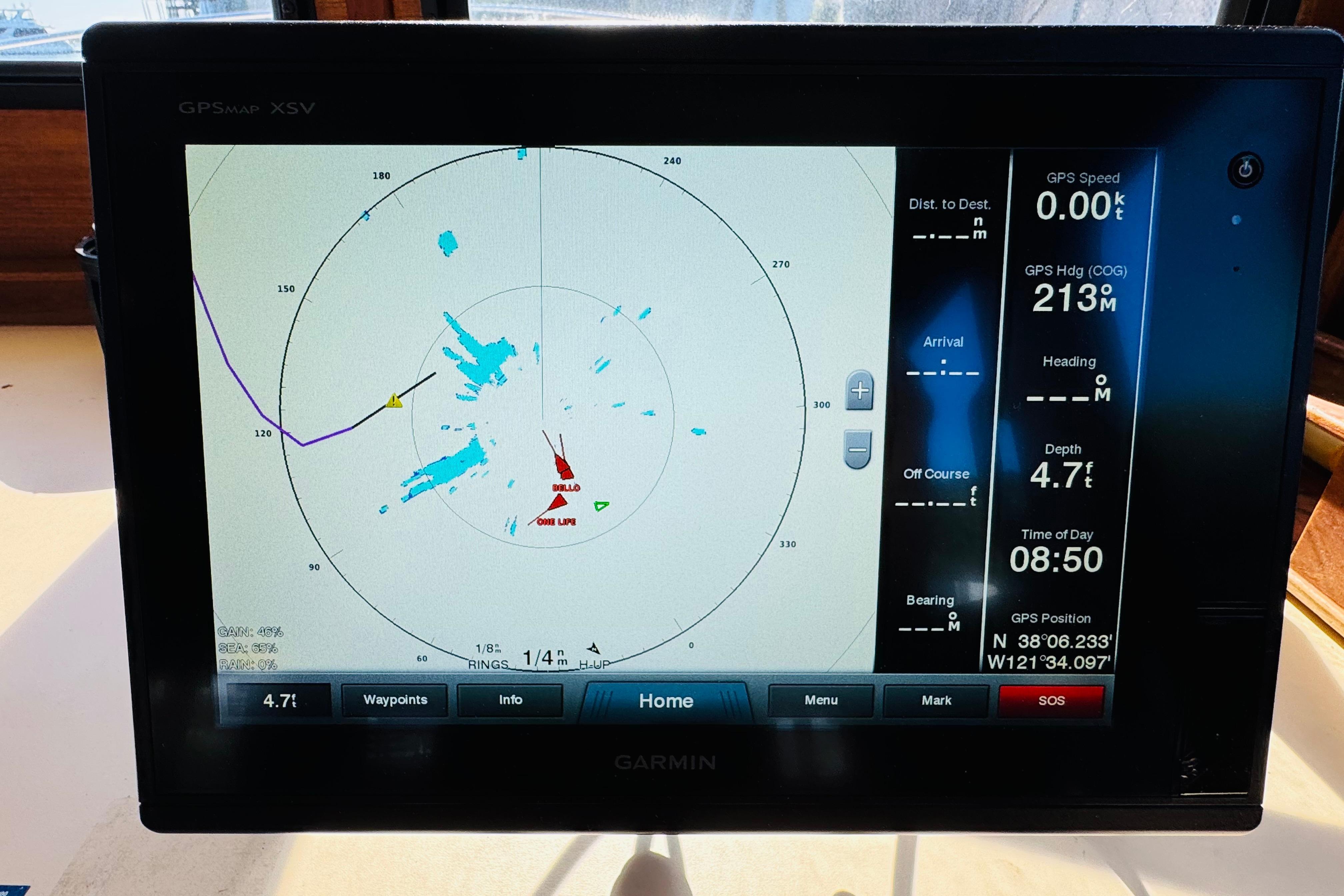 Garmin GPS display on 1996 Nordic Tug 32, showing navigation and depth data.