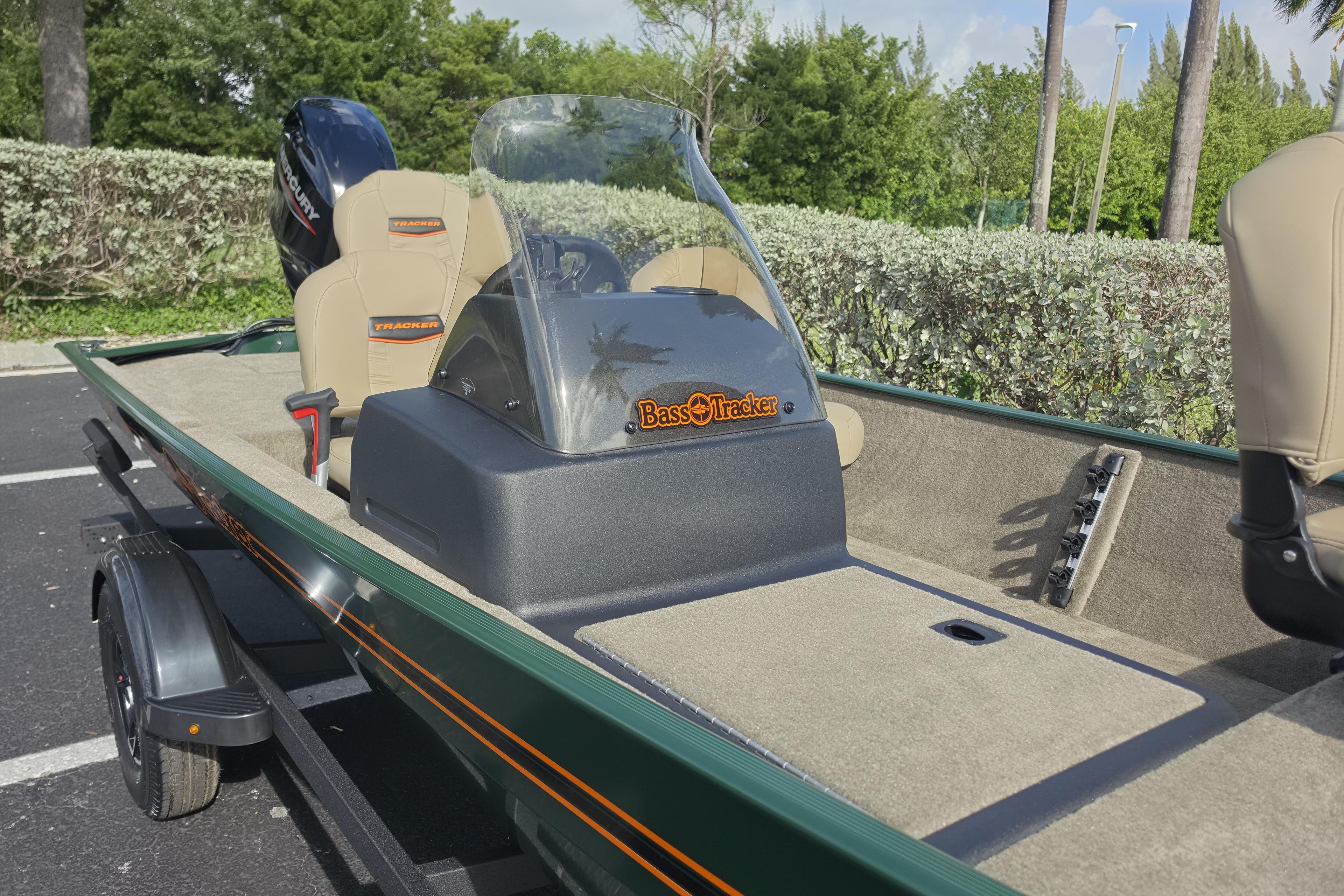 2026 Tracker Bass Tracker Classic Limited boat with beige seats and Mercury engine.