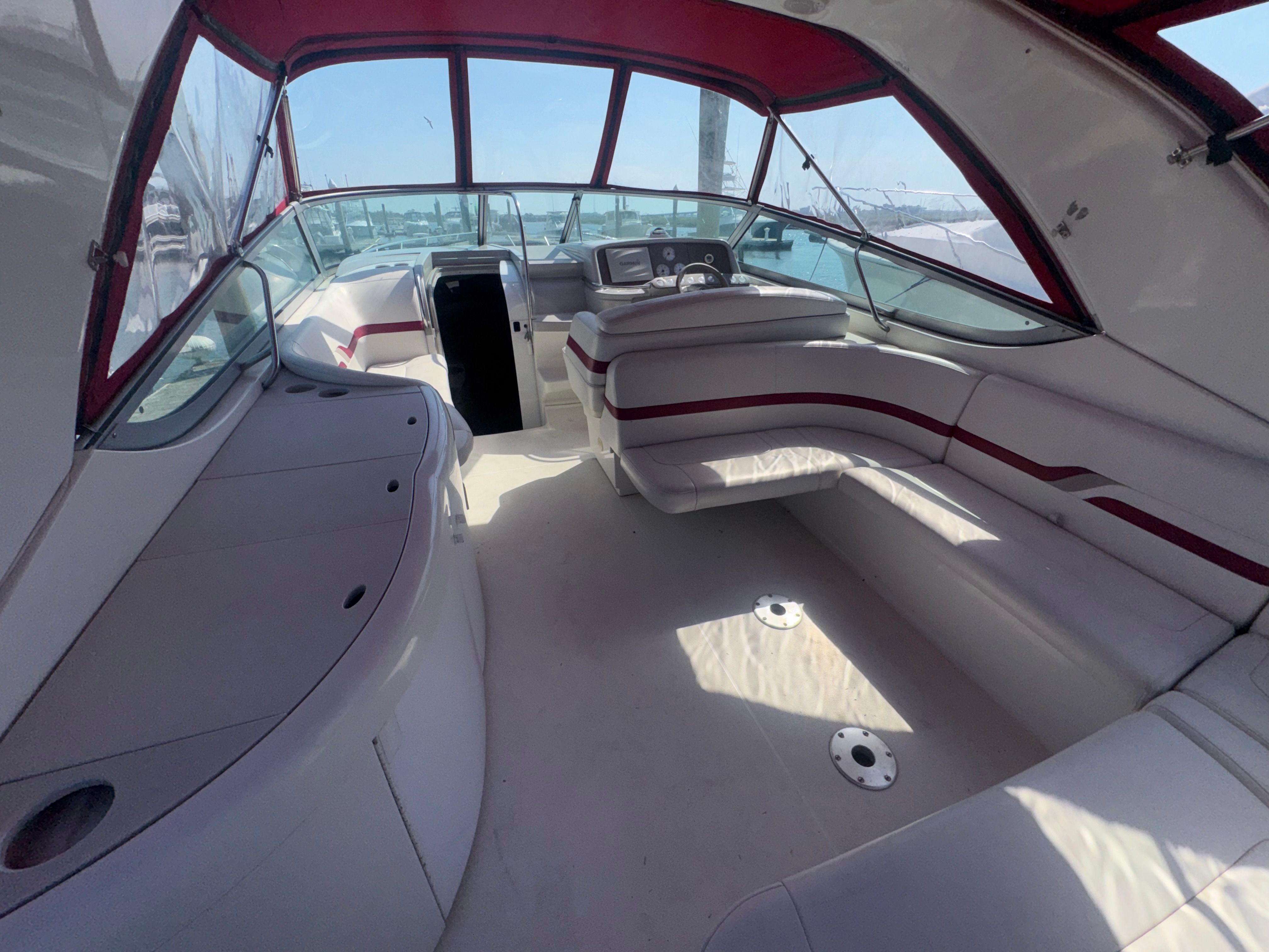 Interior of a 2001 Formula 37 SUPER SPORT yacht with red canopy.