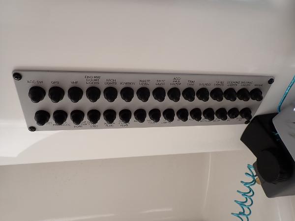 Control panel of a 2011 Chaparral 287 SSX boat with labeled switches.