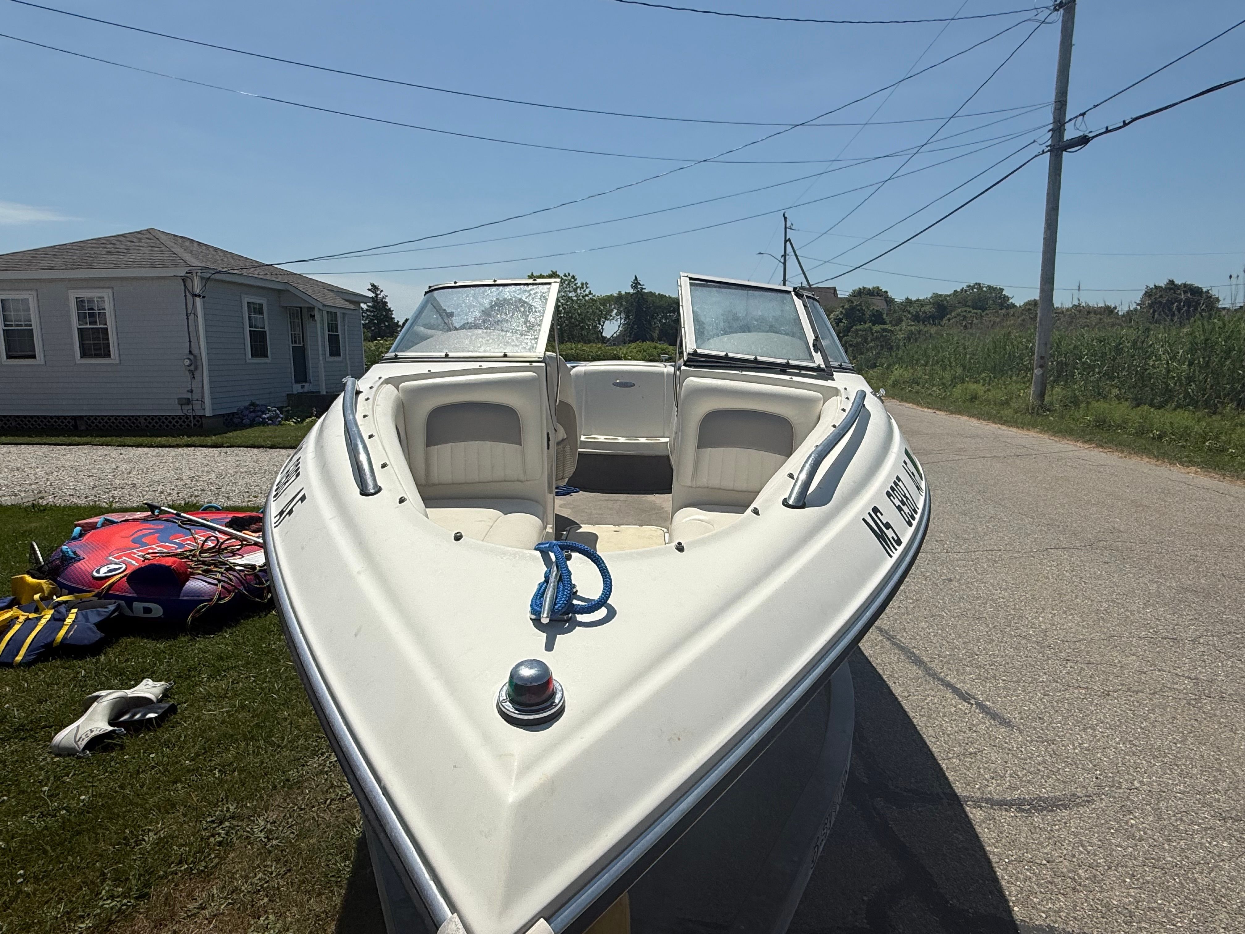 2003 Stingray 180 LS/LX on a trailer, featuring an open bow and rope.