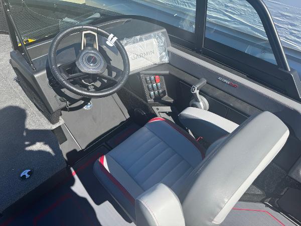 2025 Alumacraft Trophy 185X SC Rotax S boat interior with steering wheel and Garmin system.