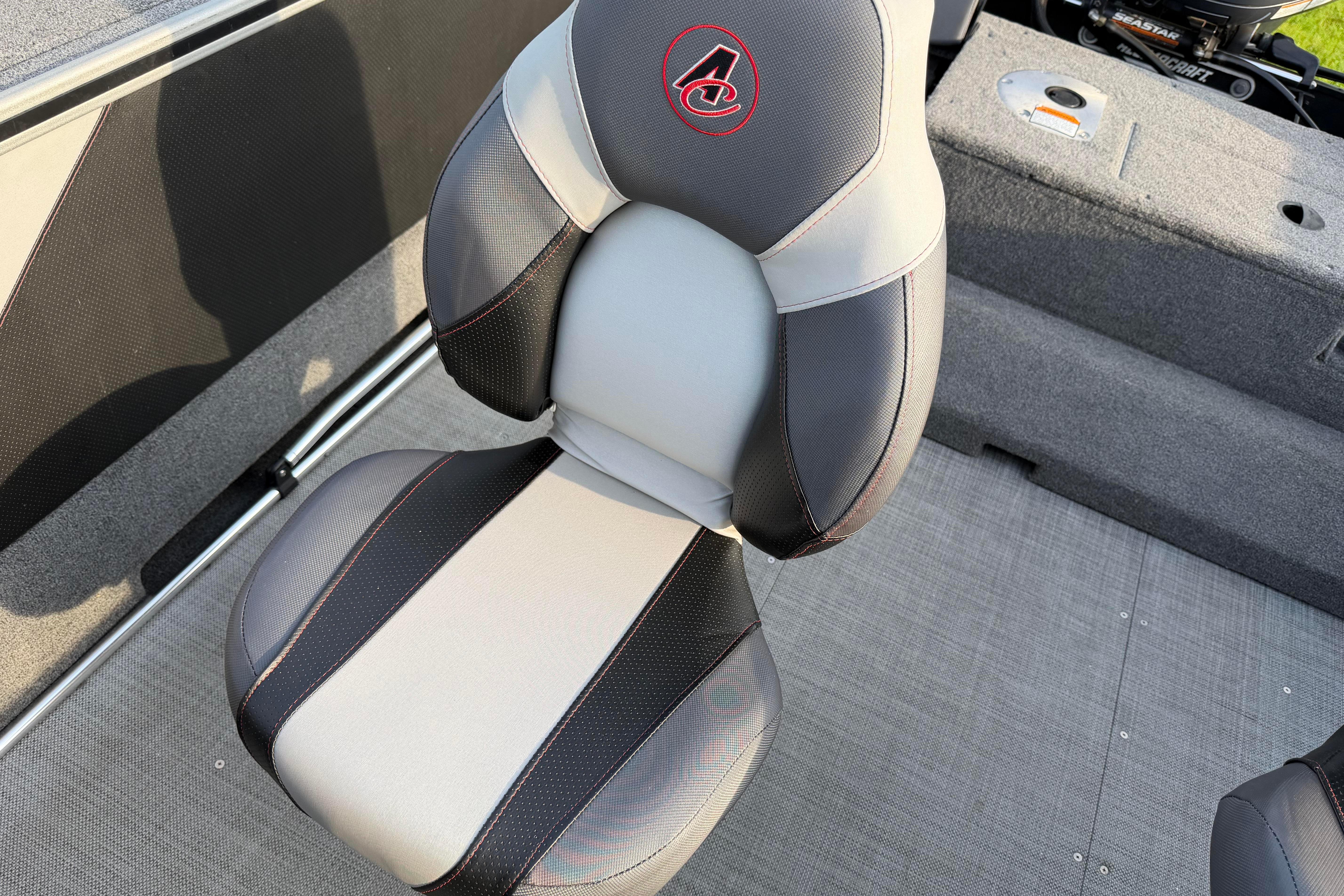 2019 Alumacraft Trophy 205 boat seat with black and gray upholstery.