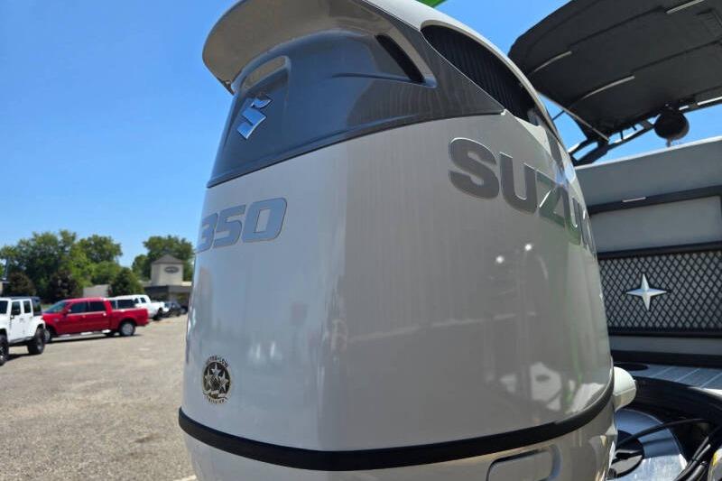 Outboard motor on a 2026 Berkshire STS Arch Performance Series boat, sunny day.