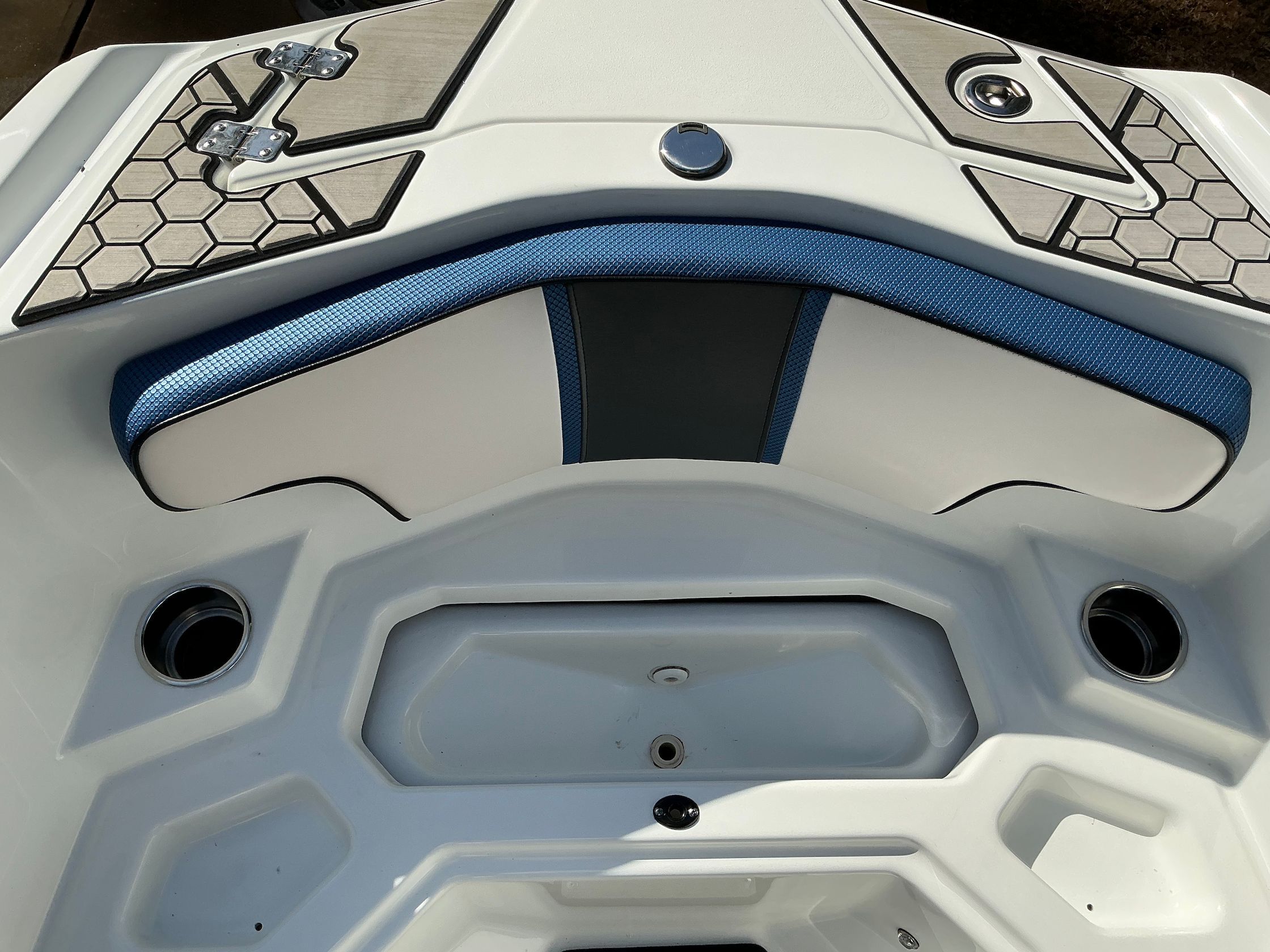 Interior of 2021 Scarab 215 ID boat with blue accents.