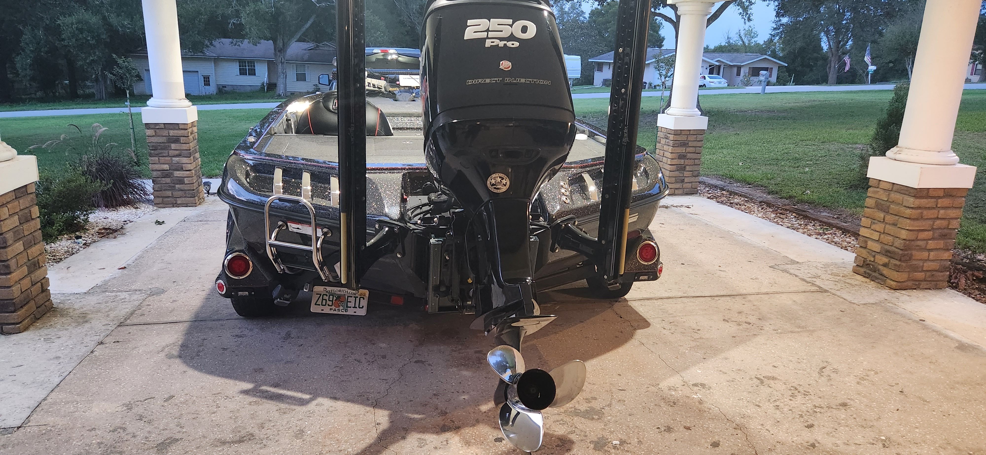 A 2017 Ranger Z520 Comanche is parked under a carport. The outboard motor is visible.