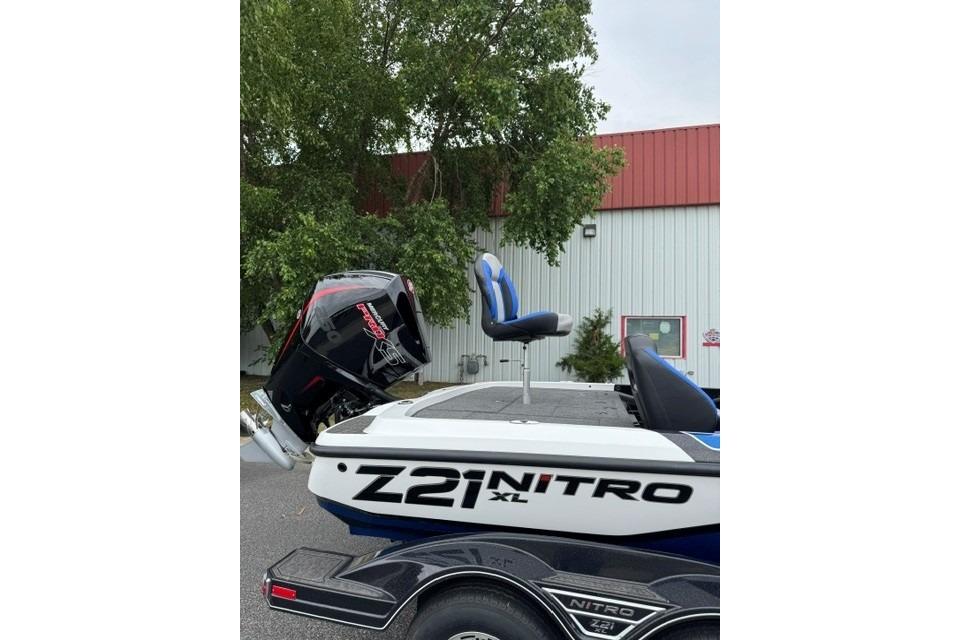 2026 Nitro Z21 XL boat with blue seats and powerful outboard motor.