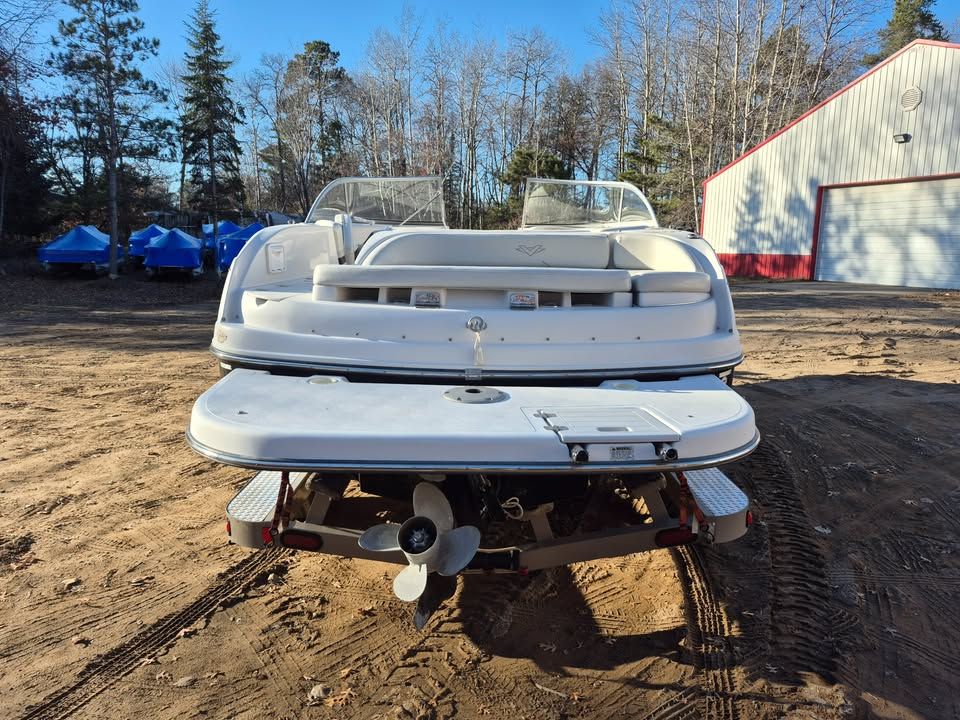 Rear view of a 2008 Vectra 2402 IO boat on dry land.