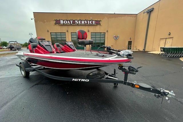 2026 Nitro Z19 XL boat parked outside a boat service center.