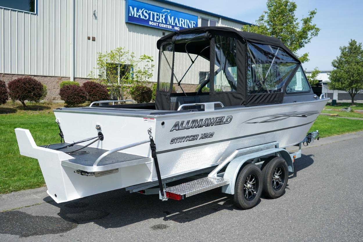 2026 Alumaweld X202 Stryker boat on trailer at Master Marine Boat Center.