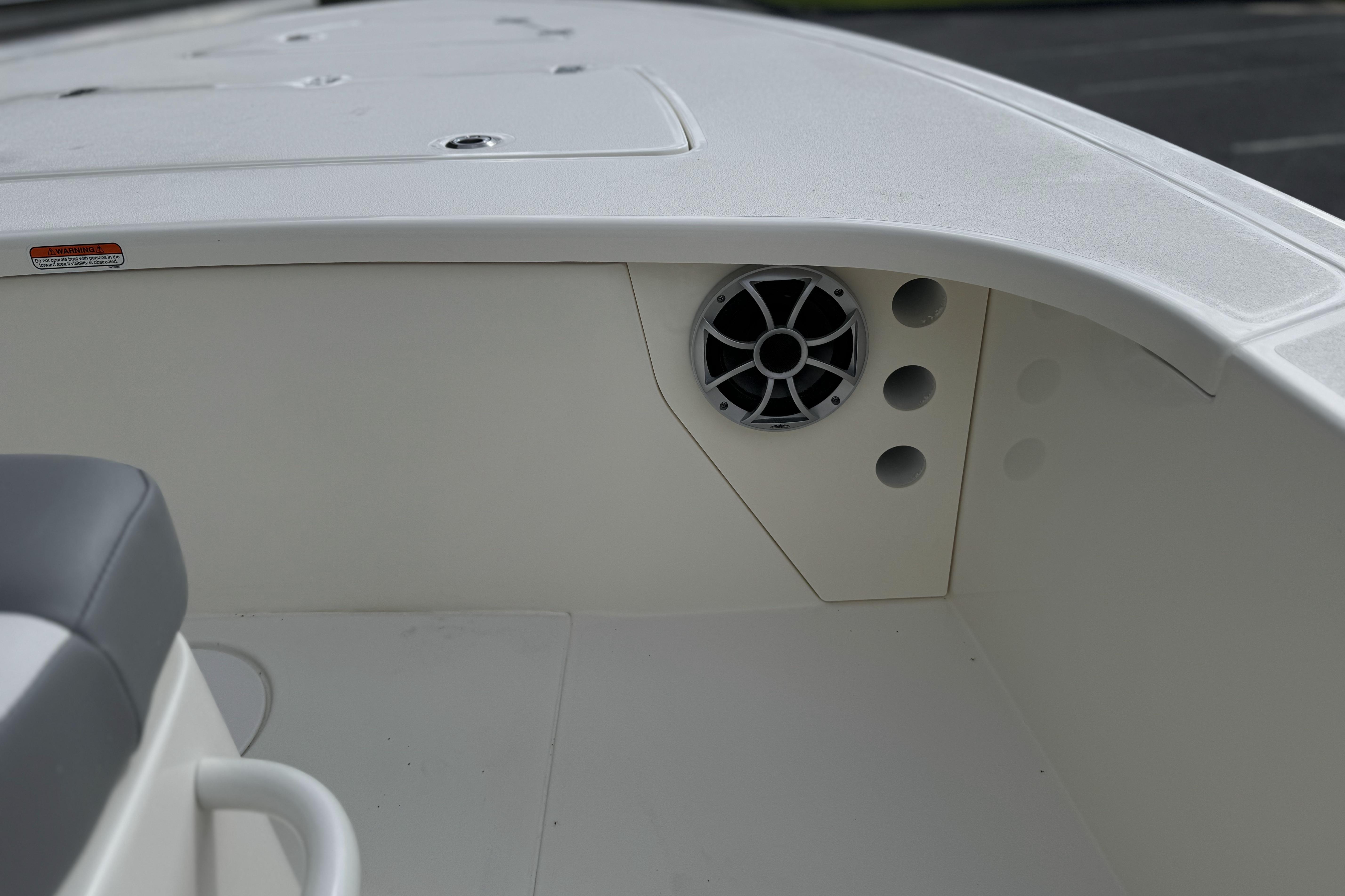 2026 Mako 18 Pro Skiff interior with speaker and seating detail.