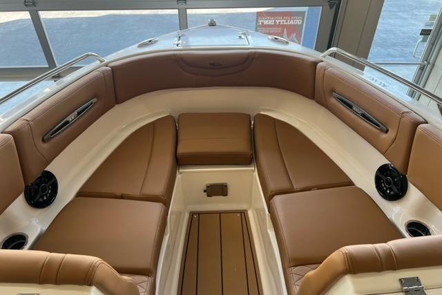 2025 Chaparral 247 SSX boat interior with tan leather seating and modern design.