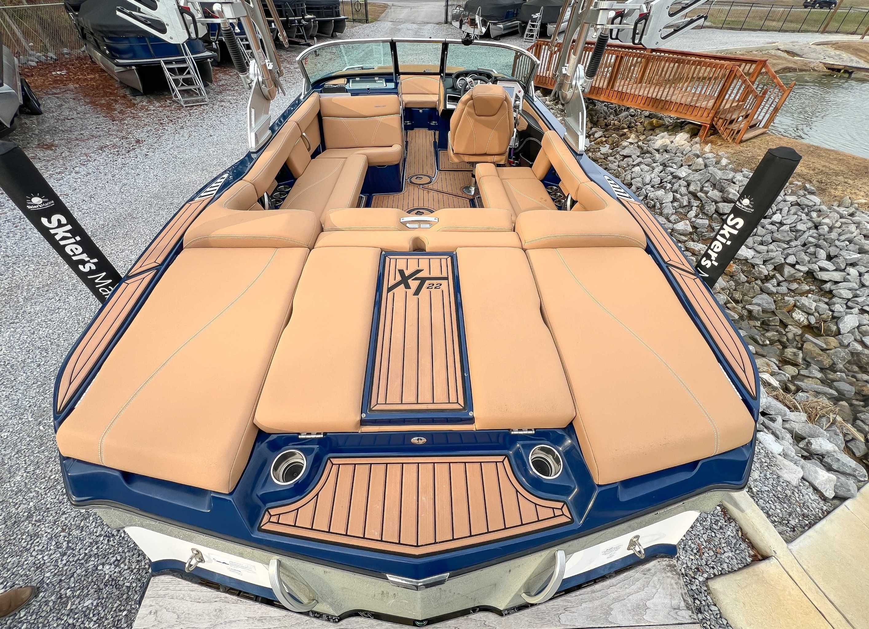 2021 MasterCraft XT22 boat with luxurious interior and teak accents.