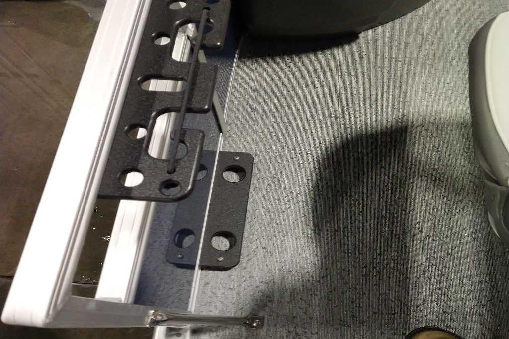 Interior view of 2026 Sun Tracker Bass Buggy 18 DLX boat with seating and flooring.