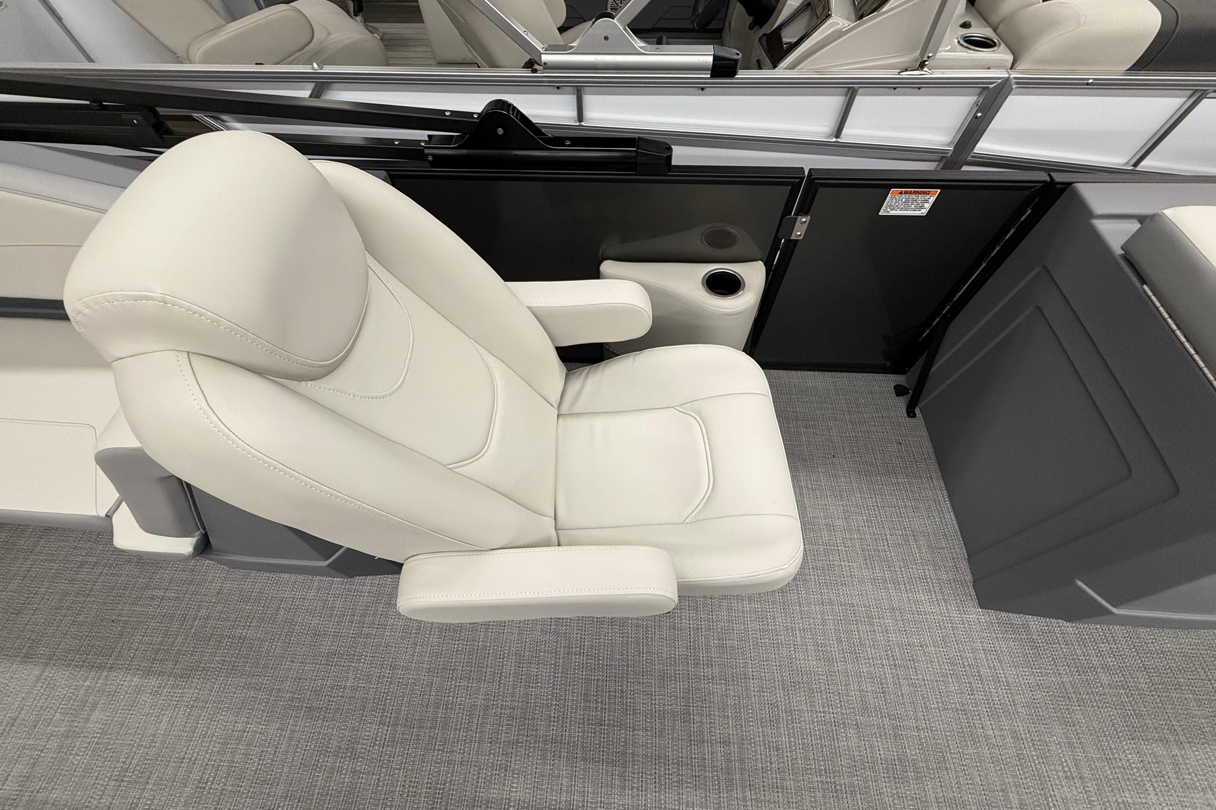 Luxurious seating on 2025 SunChaser Lucerne 22 LR DH pontoon boat, featuring plush white upholstery.
