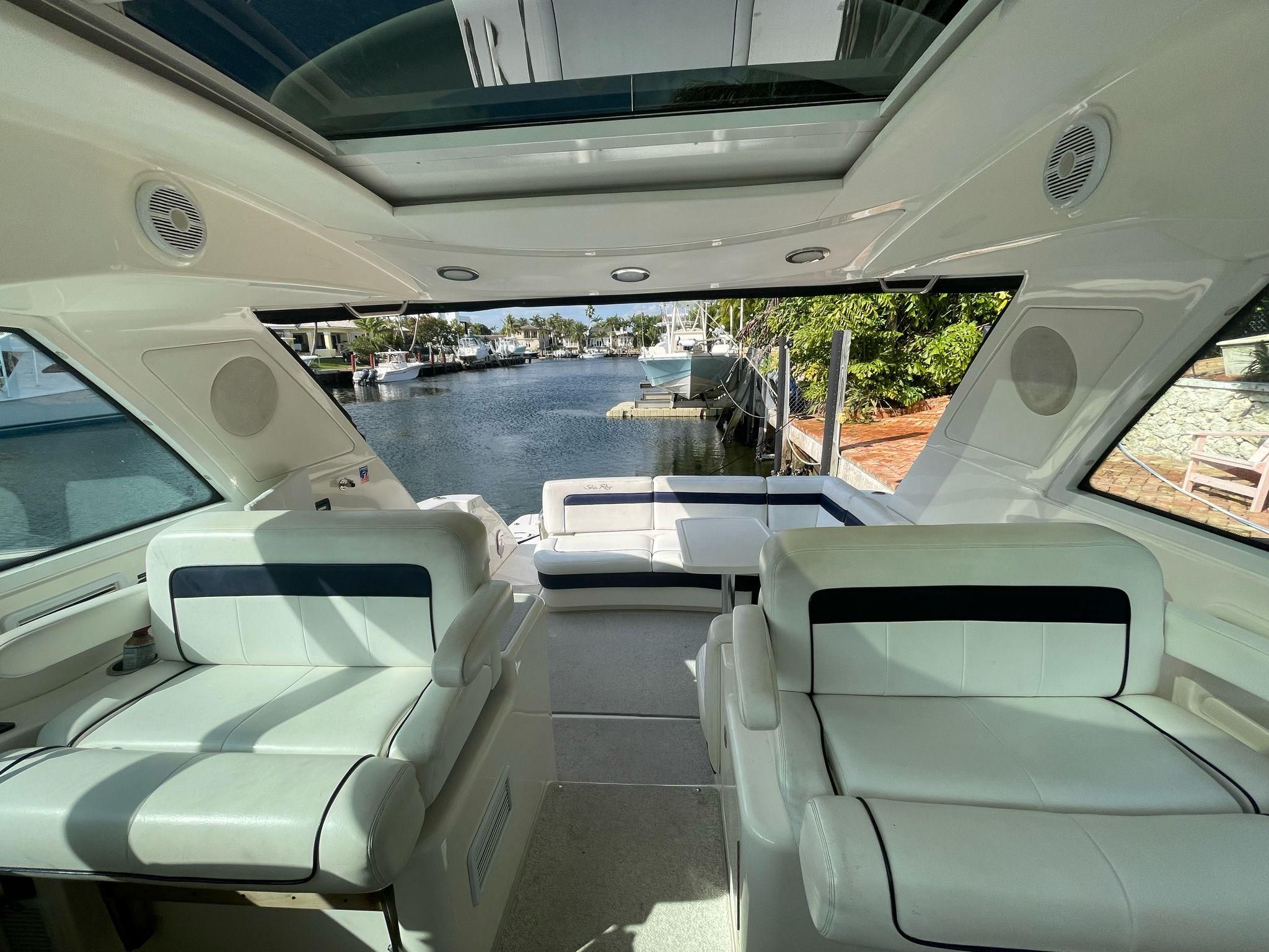 Interior of a 2010 Sea Ray 450 yacht overlooking the harbor.