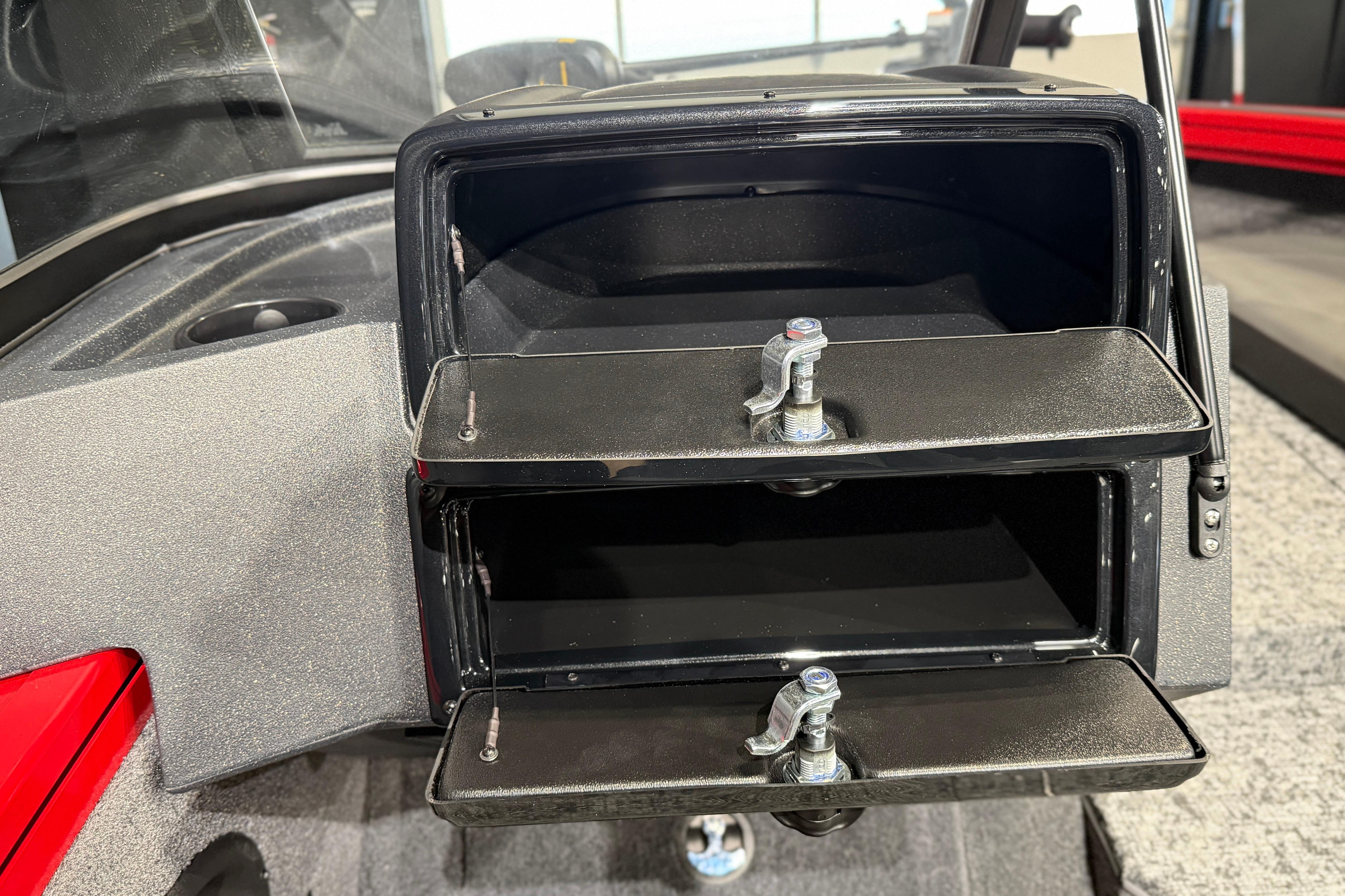 2026 Tracker Targa V-18 Combo boat storage compartments with secure latches.