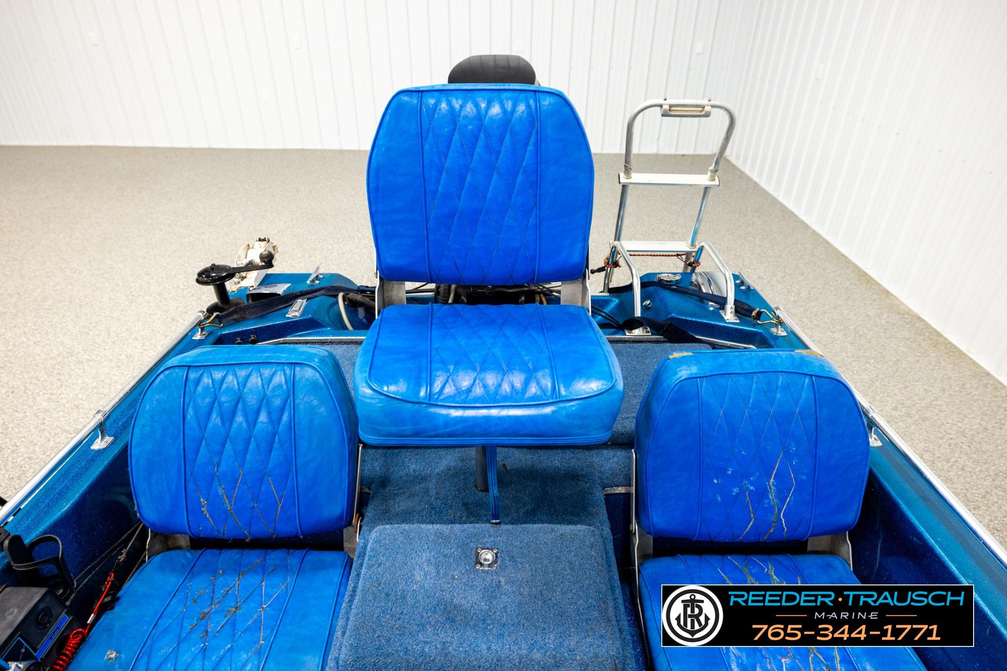 1980 Ranger 175 VS boat with blue seats and marine equipment.