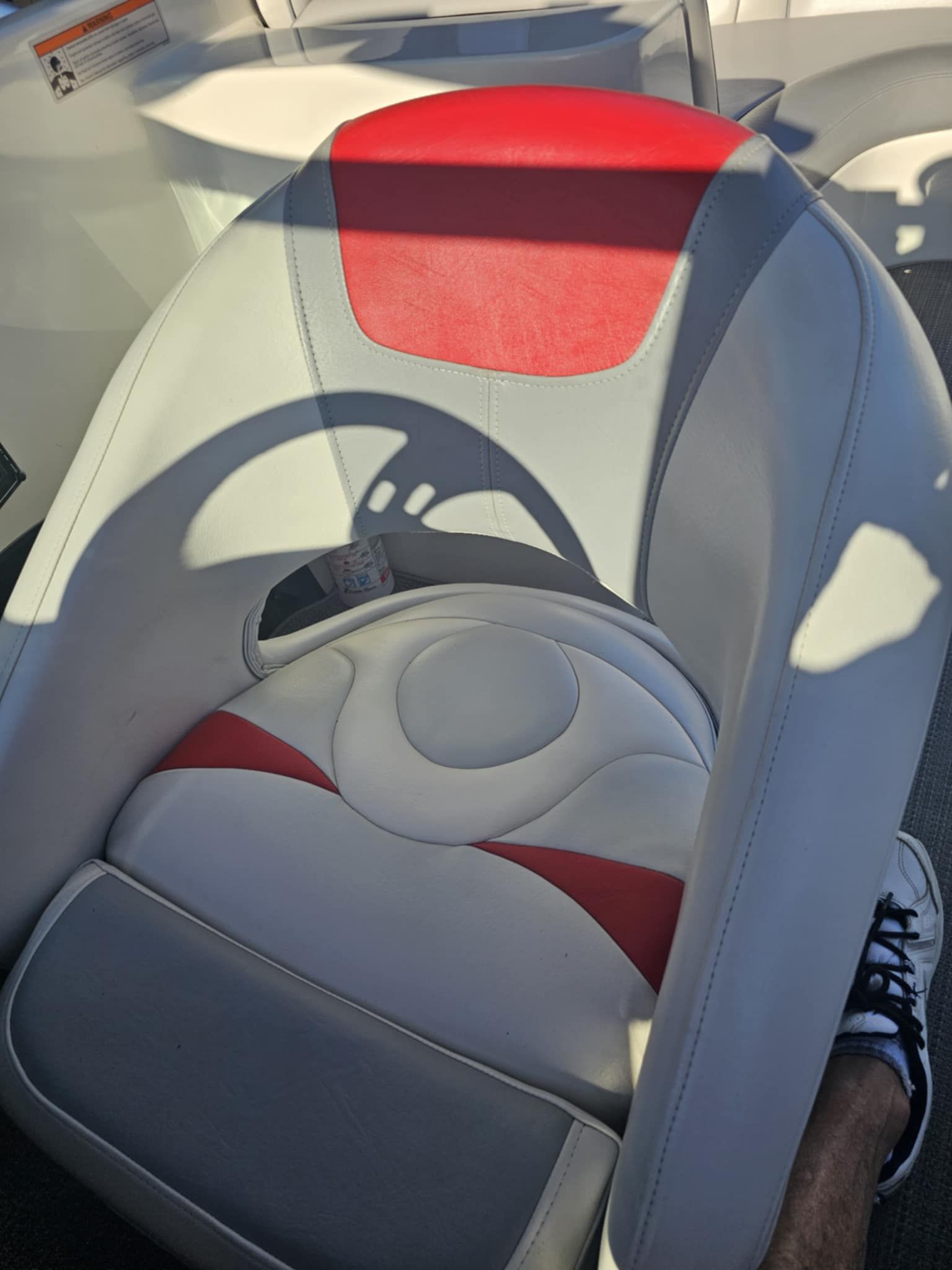 MB PIGPR 2006 boat seat with red and gray design.