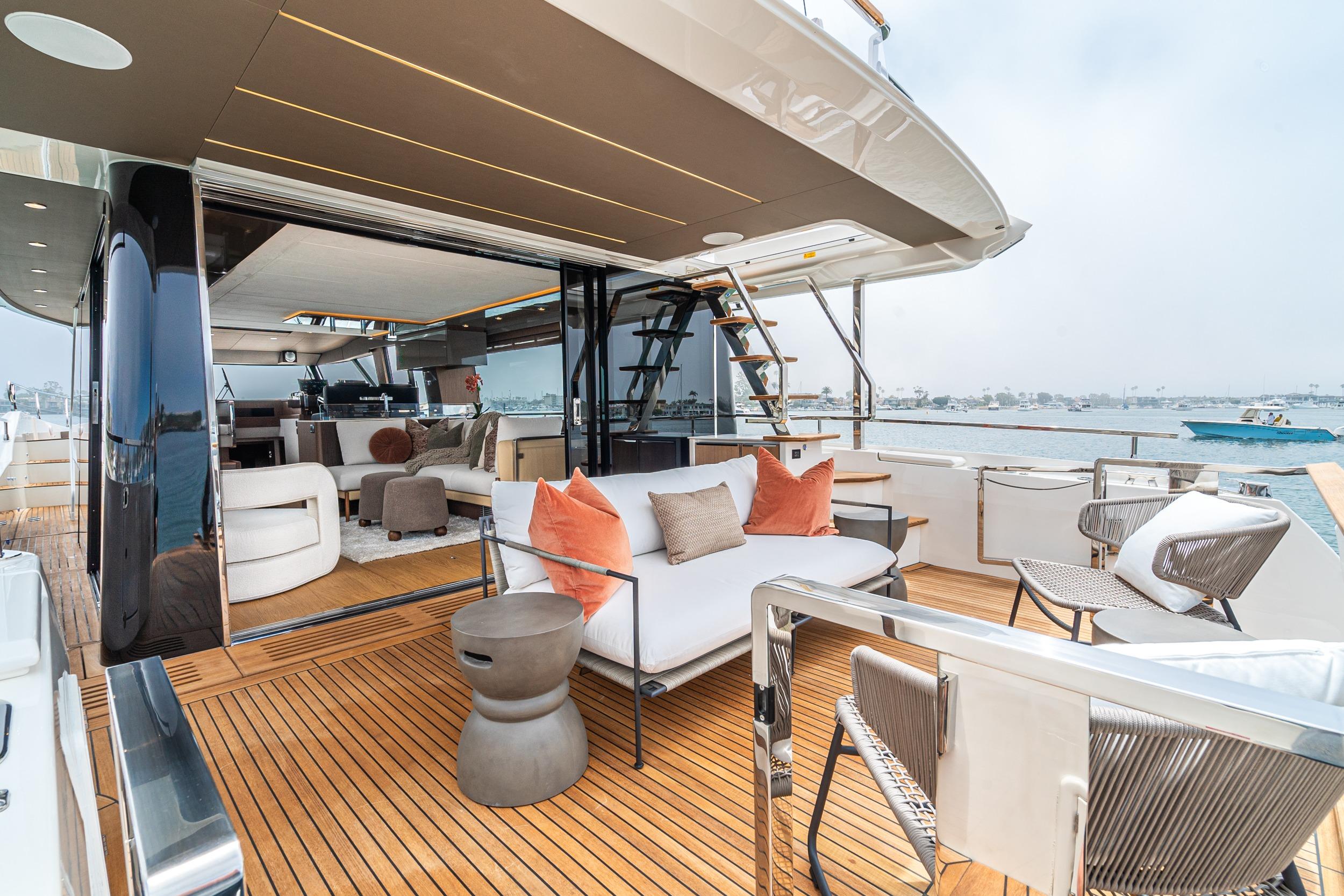 Luxurious 2024 Prestige X60 yacht deck with modern seating and ocean view.