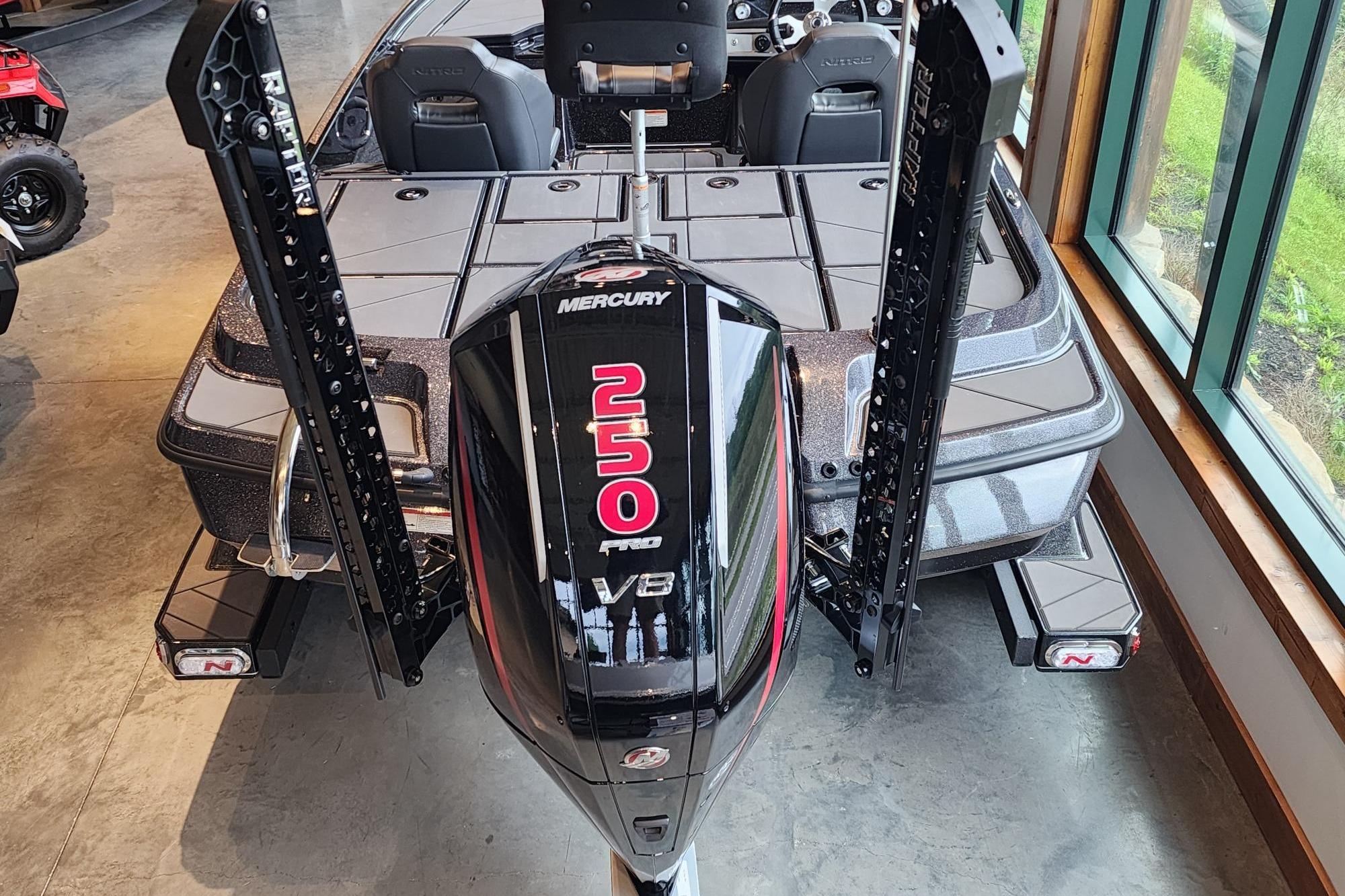 2026 Nitro Z20 XL boat with Mercury 250 Pro XS V8 engine in showroom.