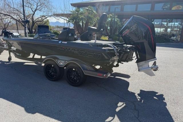 2026 Nitro Z20 XL Pro boat with powerful outboard motor, parked outdoors.
