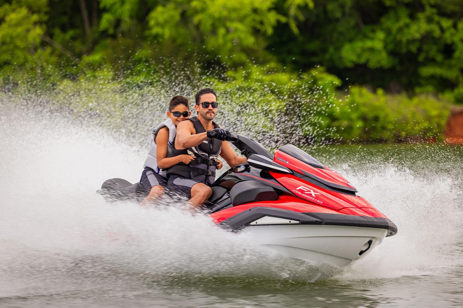 Manufacturer Provided Image: Father and son riding 2026 Yamaha WaveRunner FX Cruiser HO on a lake.
