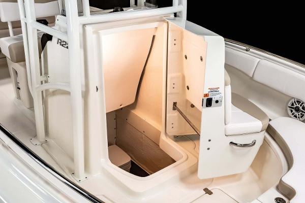 Manufacturer Provided Image: 2022 Robalo R222 Center Console boat with open storage compartment.