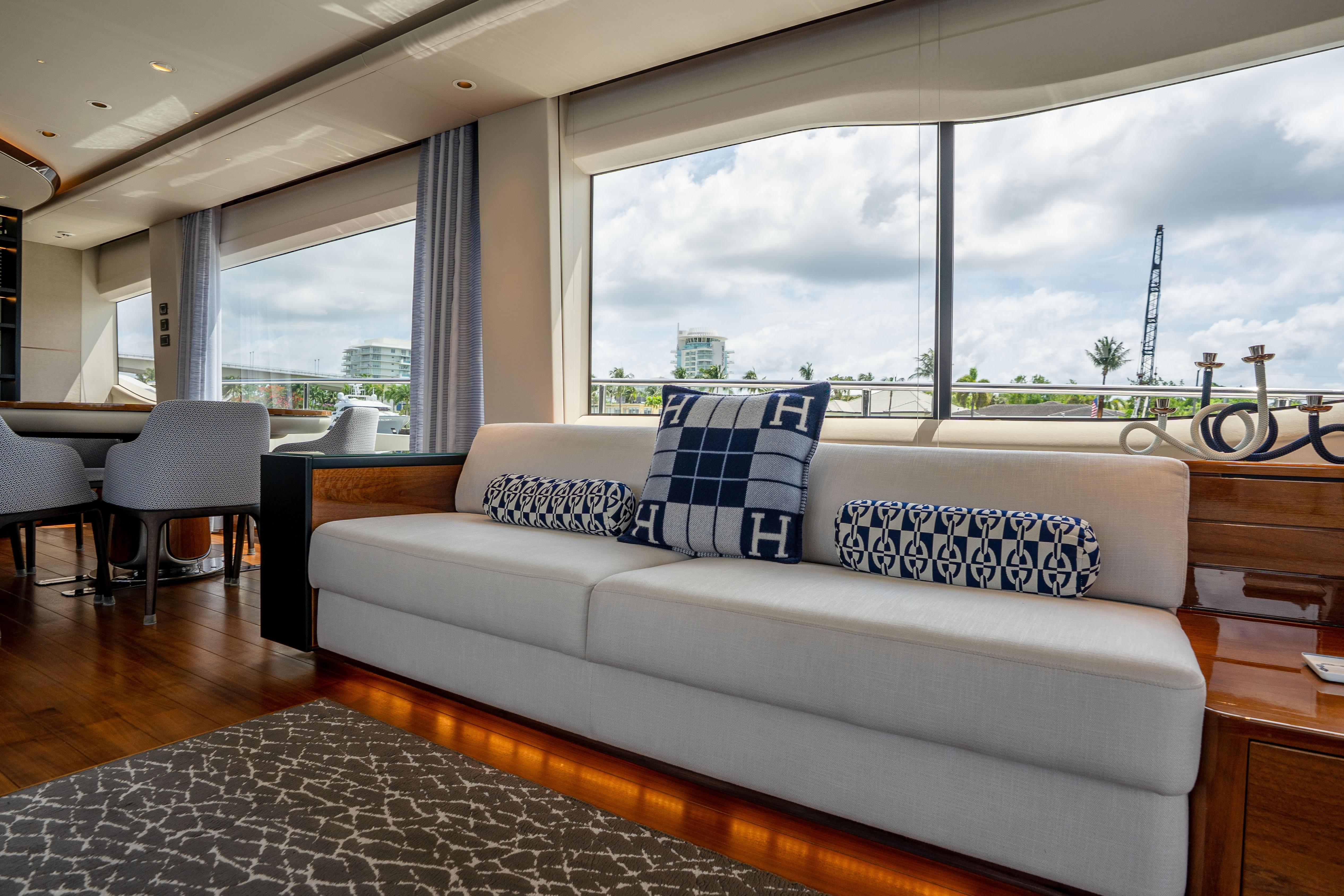 Luxurious interior of 2020 Princess Y85 yacht with elegant seating and decor.