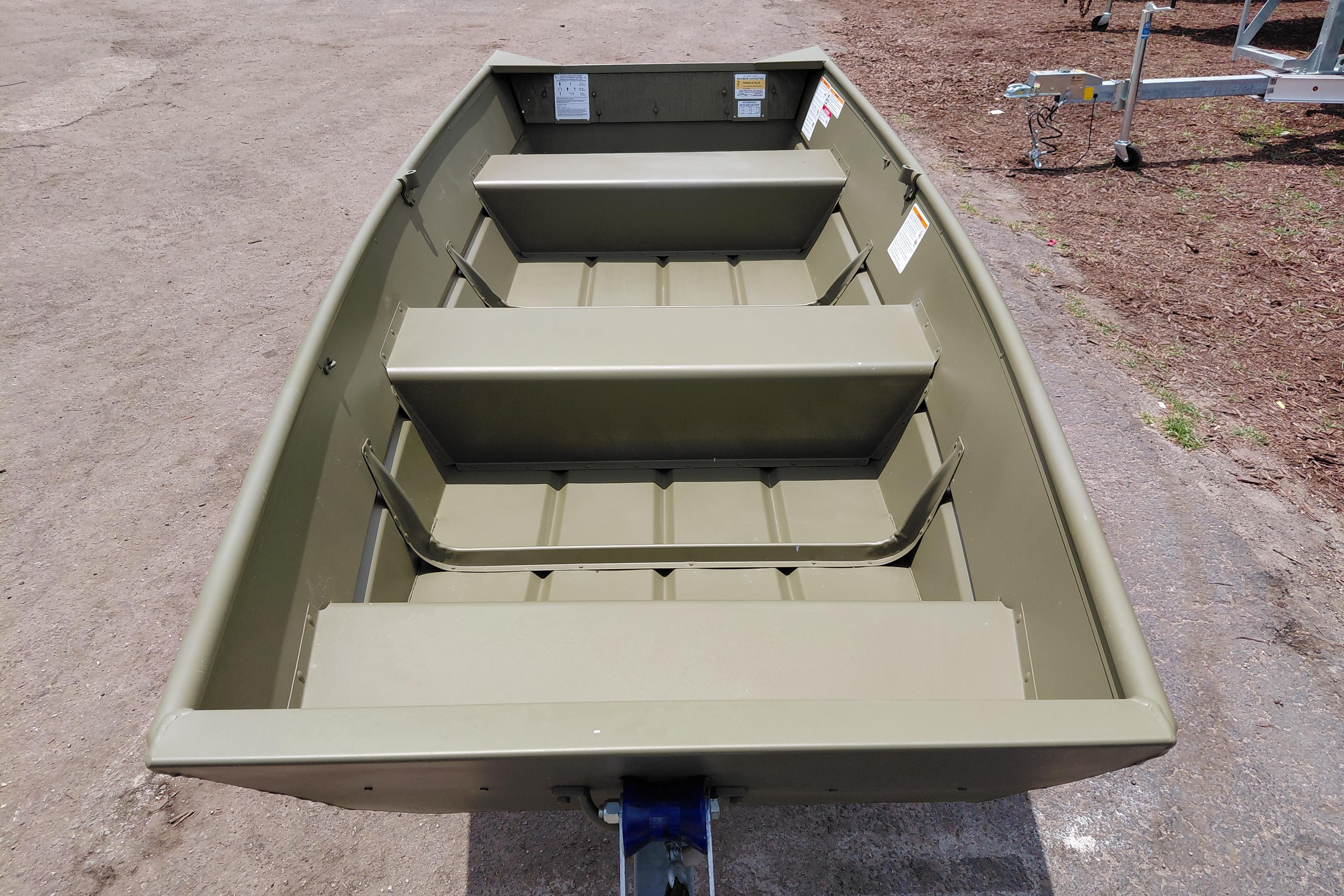 2026 Lowe L1032 Jon boat with three bench seats on a trailer.
