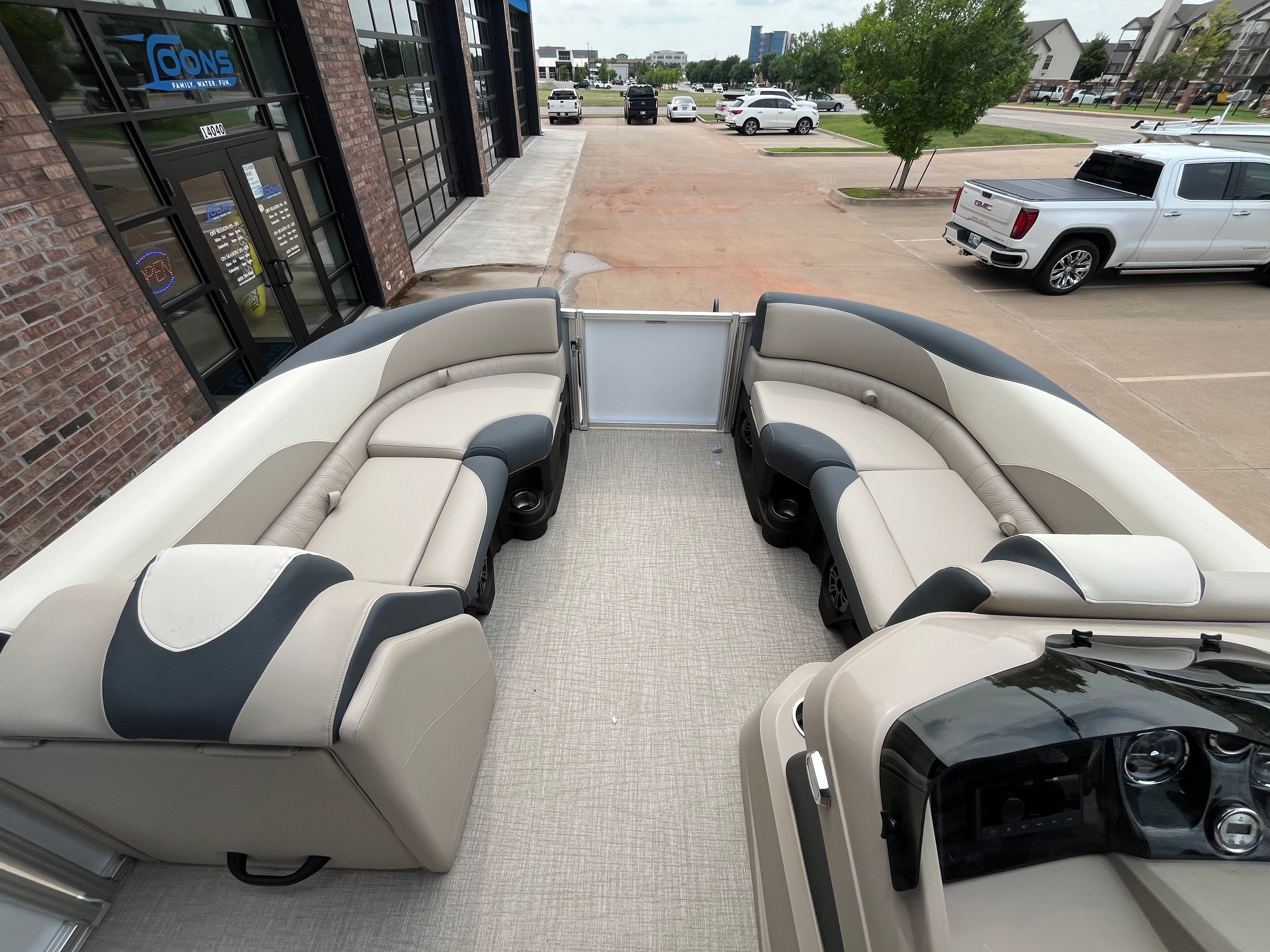 Interior of a 2025 Tahoe LTZ QL pontoon boat with luxurious seating.
