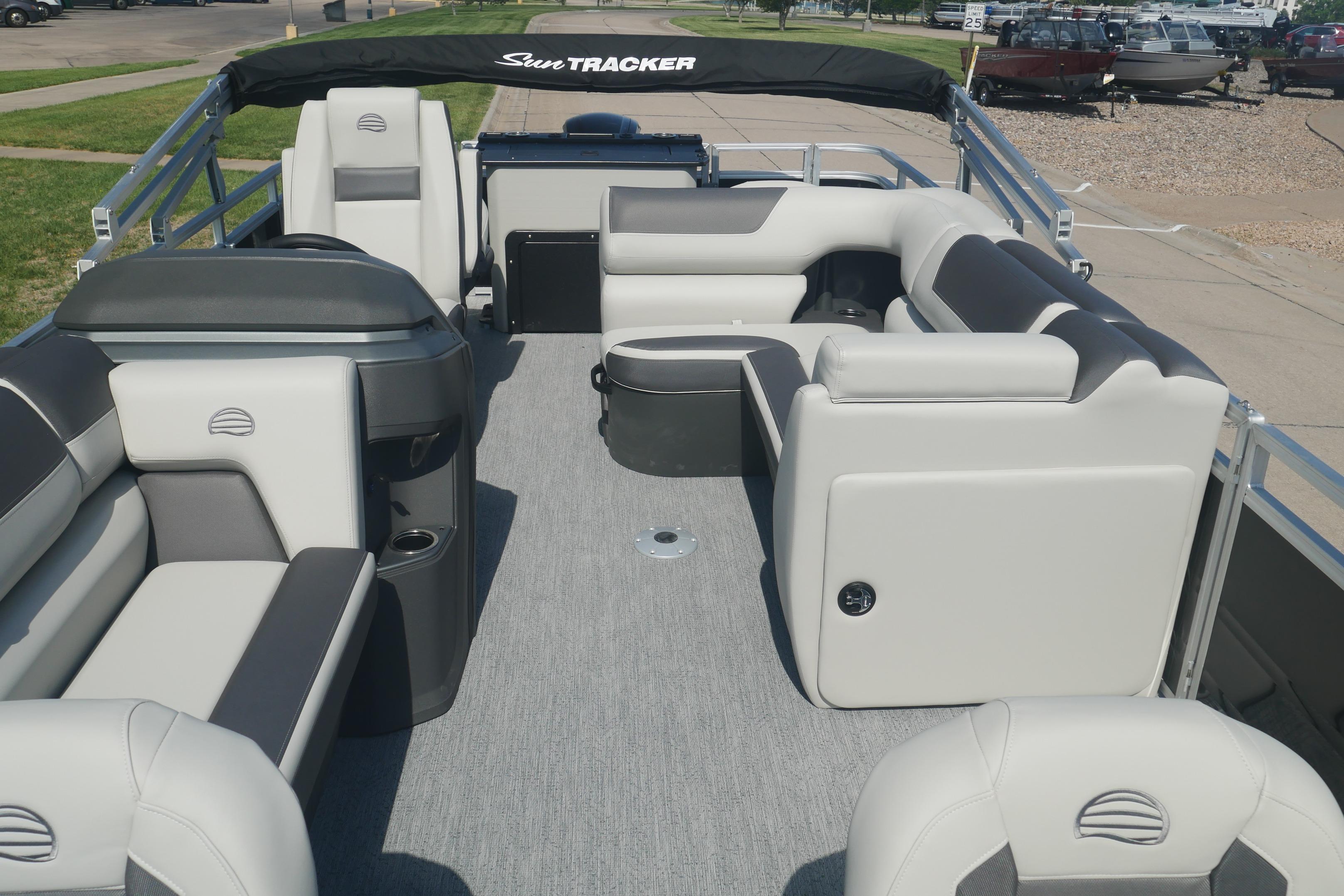 2026 Sun Tracker Fishin' Barge 20 DLX interior with spacious seating and modern design.