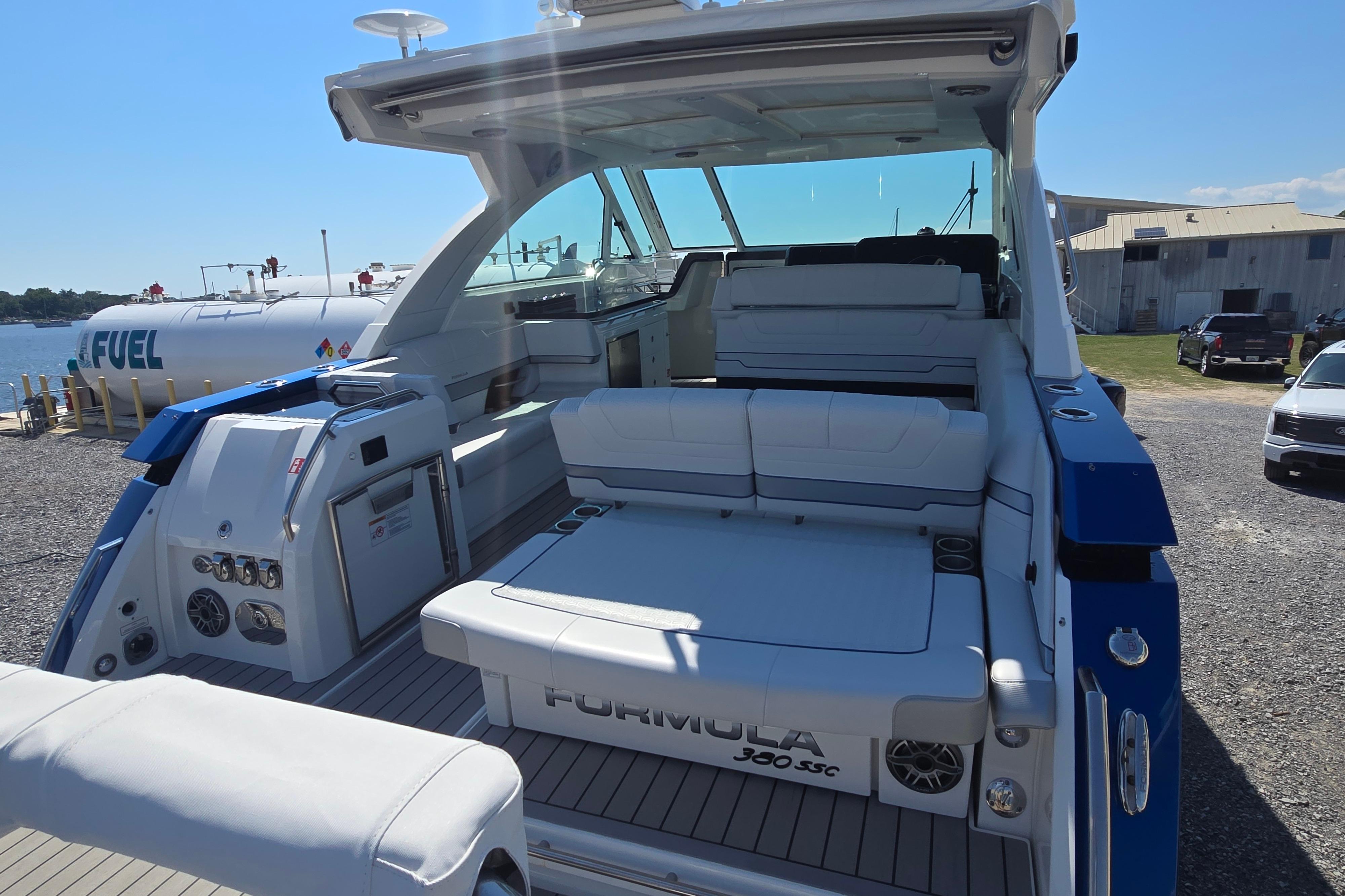 2025 Formula 380 Super Sport Crossover OB luxury boat interior at dockside.