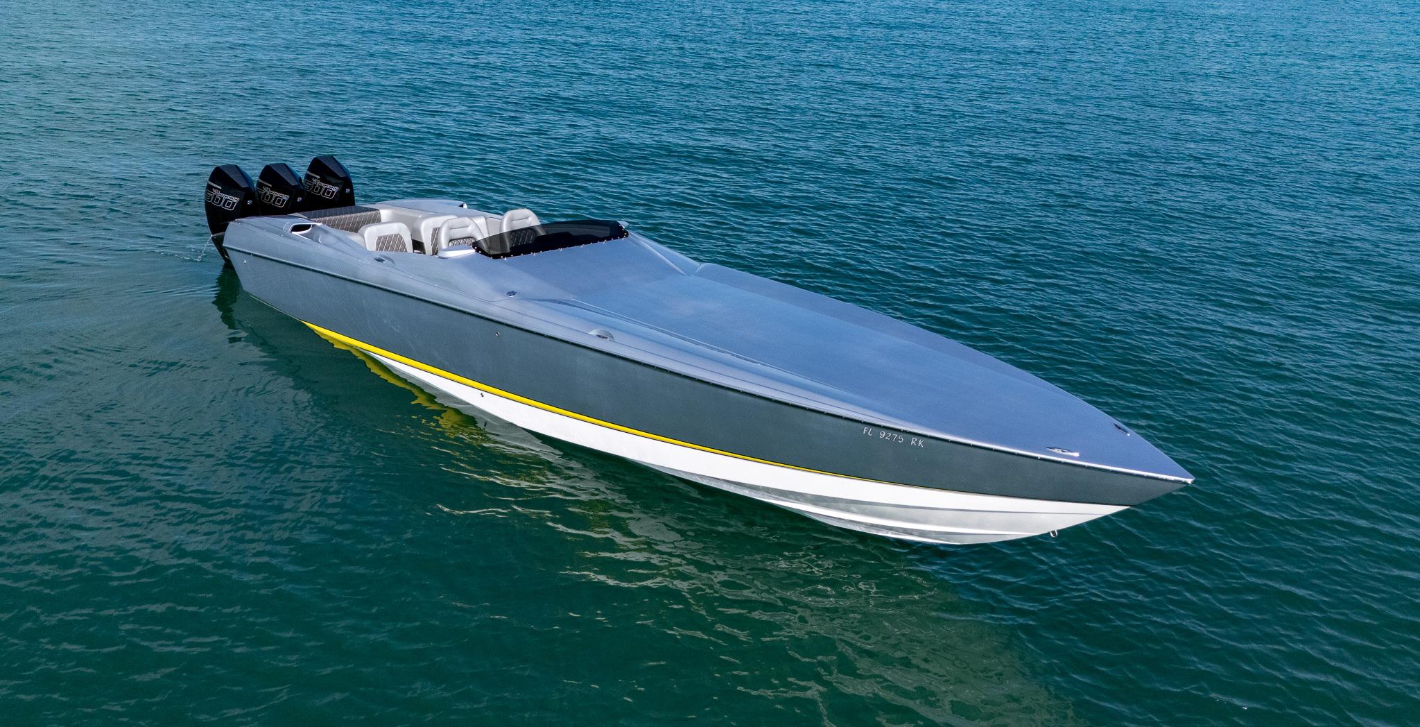 2017 Nor-Tech 3900 Super-VEE boat on calm blue water.
