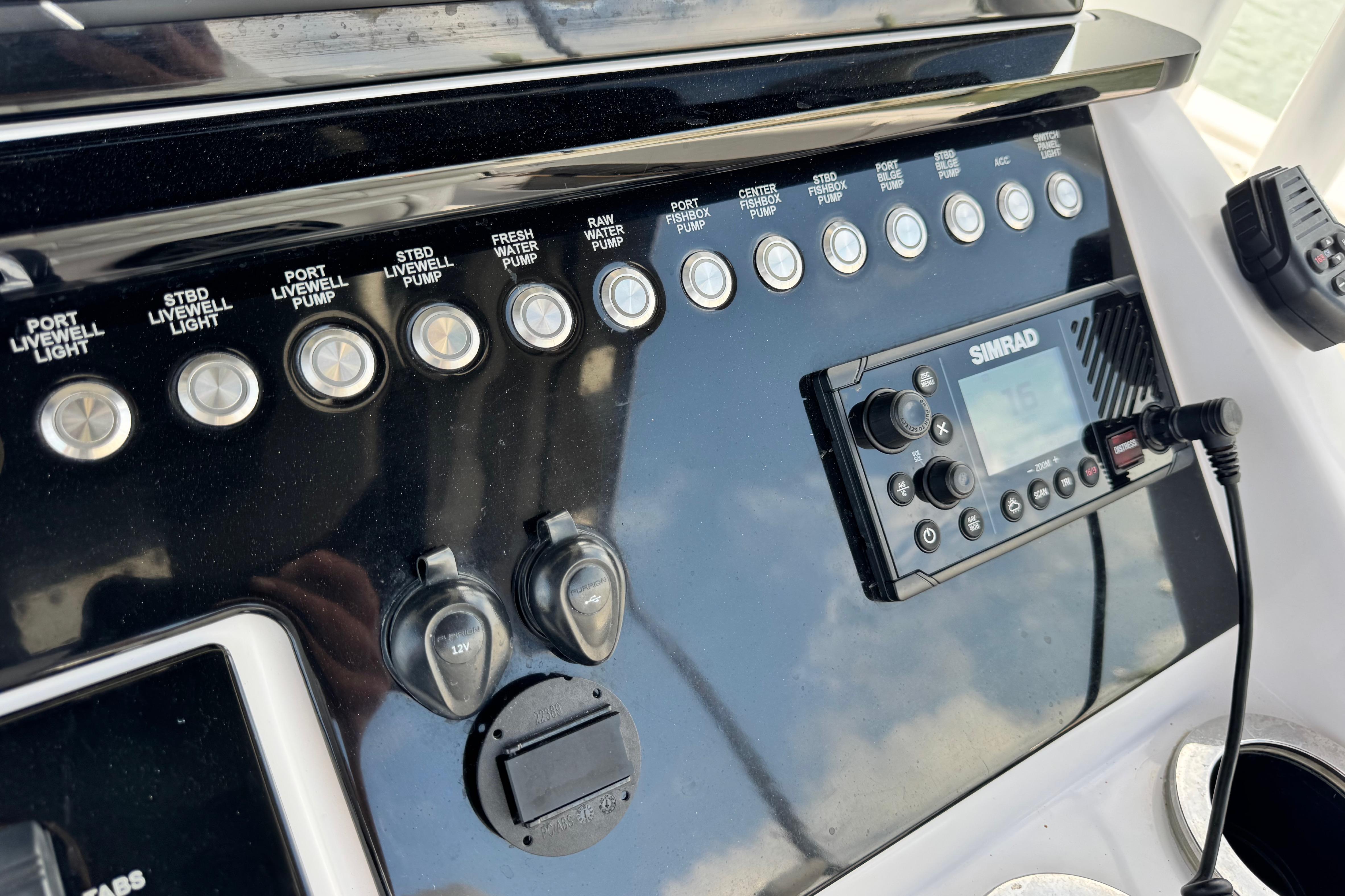 Control panel of a 2018 Fountain 34 Center Console boat with Simrad electronics.
