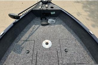 2026 Tracker Pro Guide V-175 WT boat deck with carpeted surface and storage compartments.