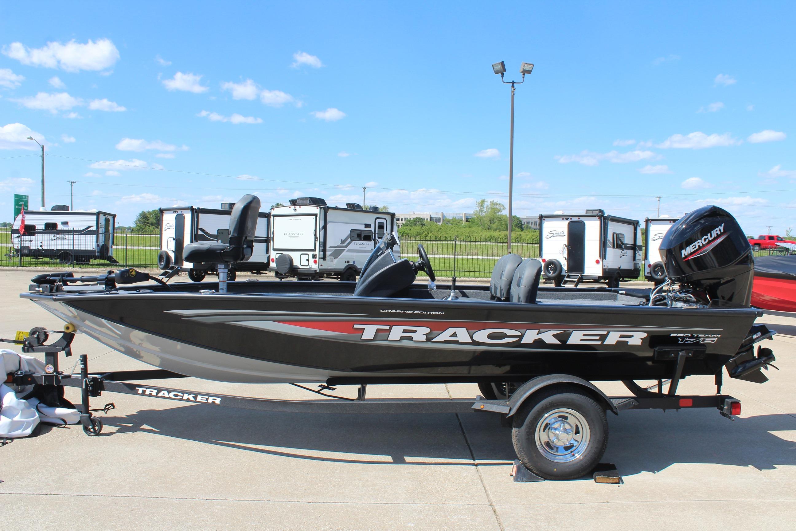 2026 Tracker Pro Team 175 Crappie Edition boat on trailer, outdoors, sunny day.