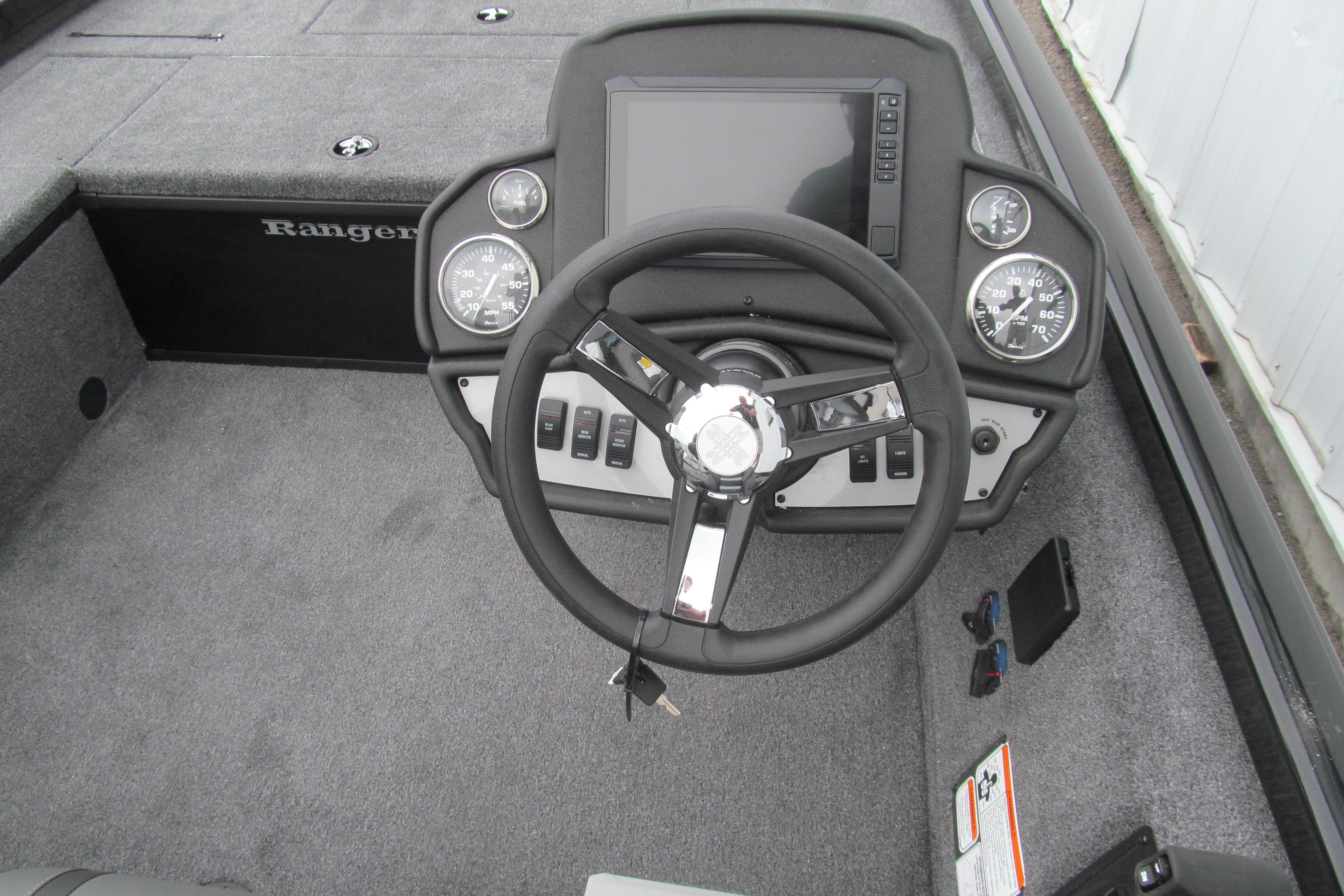 2026 Ranger RT188C boat dashboard with steering wheel and gauges.