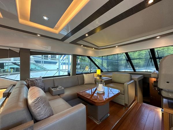 Luxurious interior of 2019 Tiara Yachts C53 with modern seating and elegant lighting.