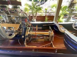 A 1980 Sanger HYDRO V DRIVE showing the engine and interior details.