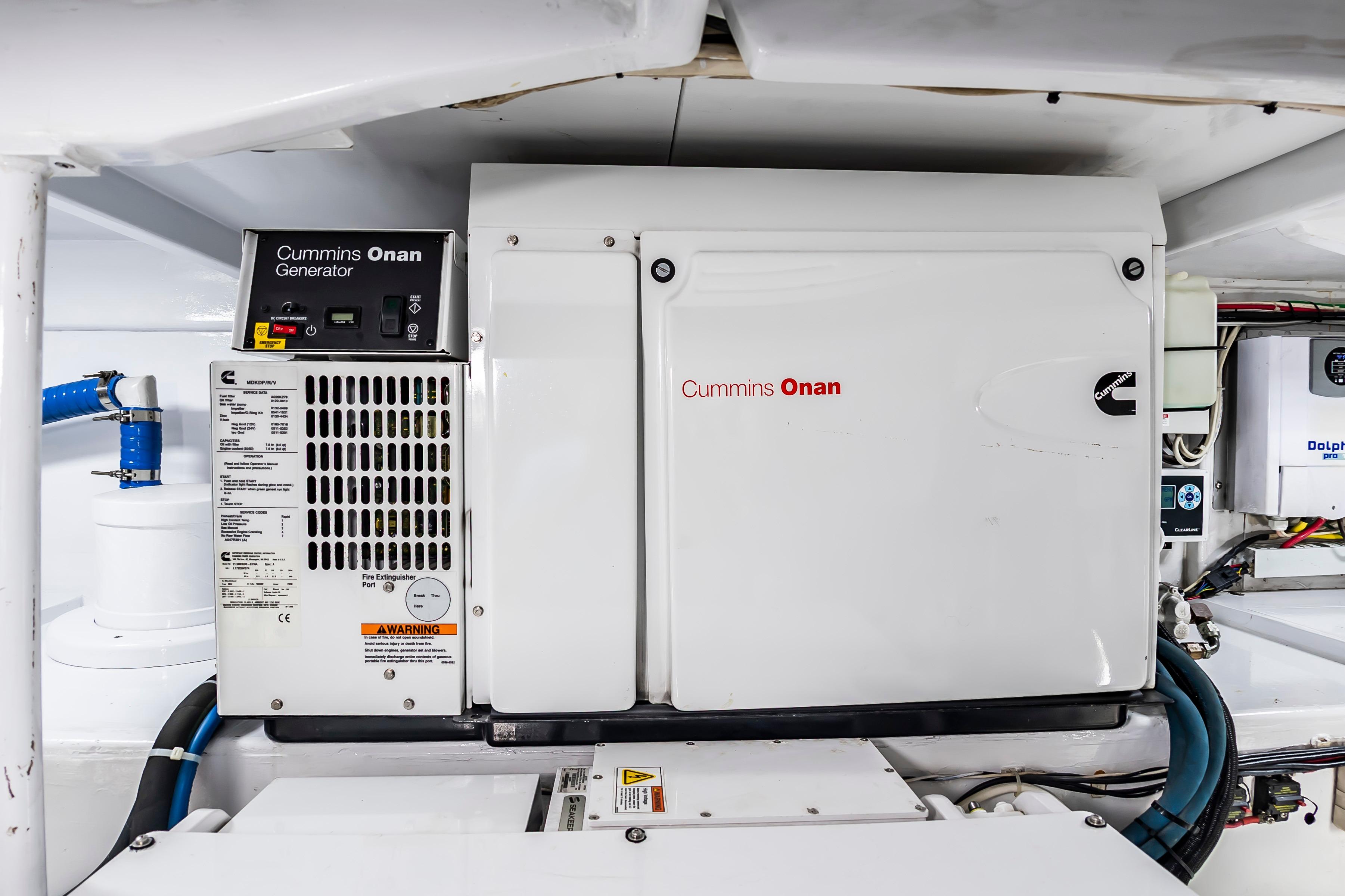 Cummins Onan generator in 1993 Custom Carolina Scarborough 56 Convertible engine room.