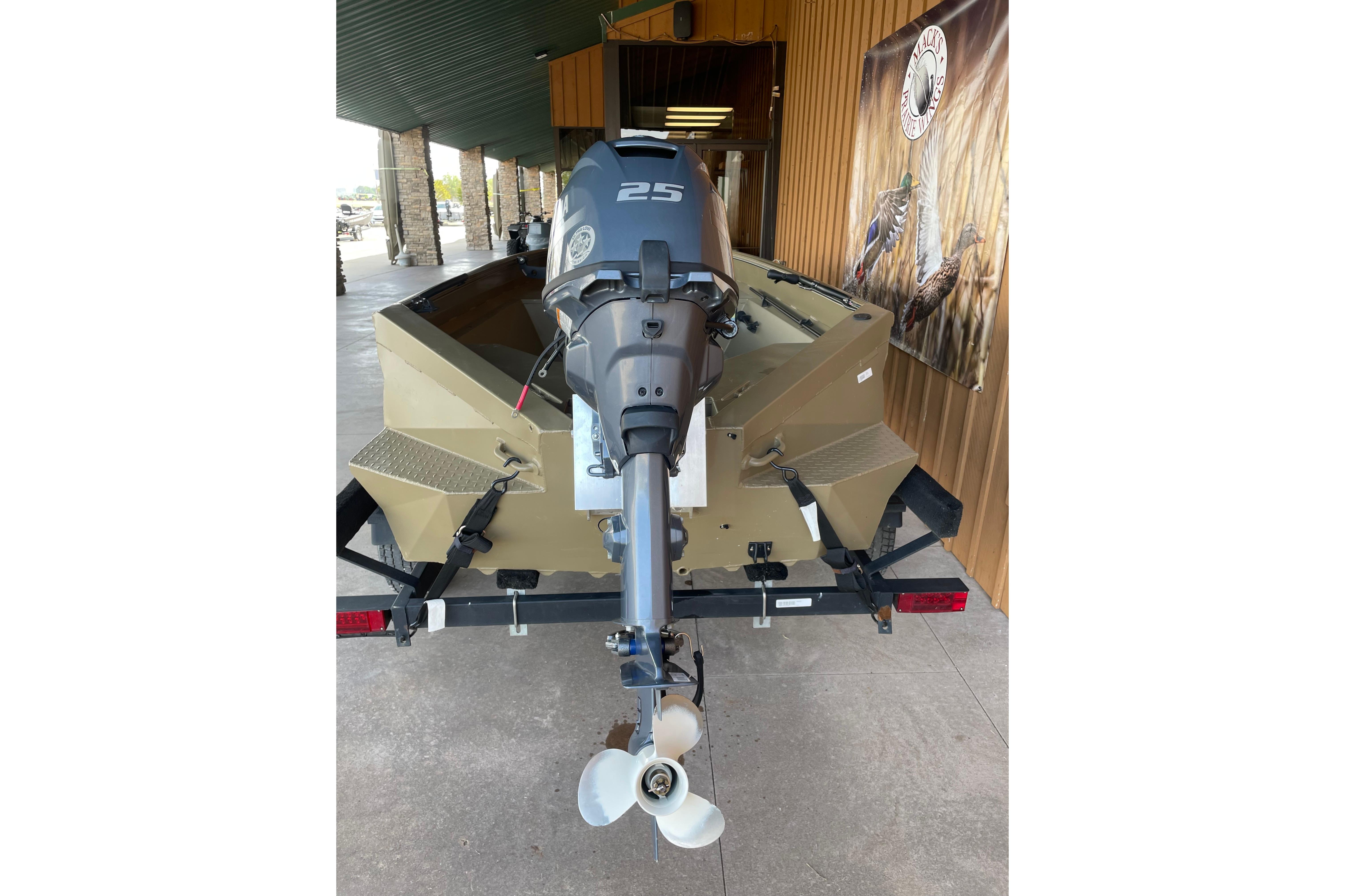 2025 Edge Duck Boats 550 with outboard motor, displayed on a trailer.
